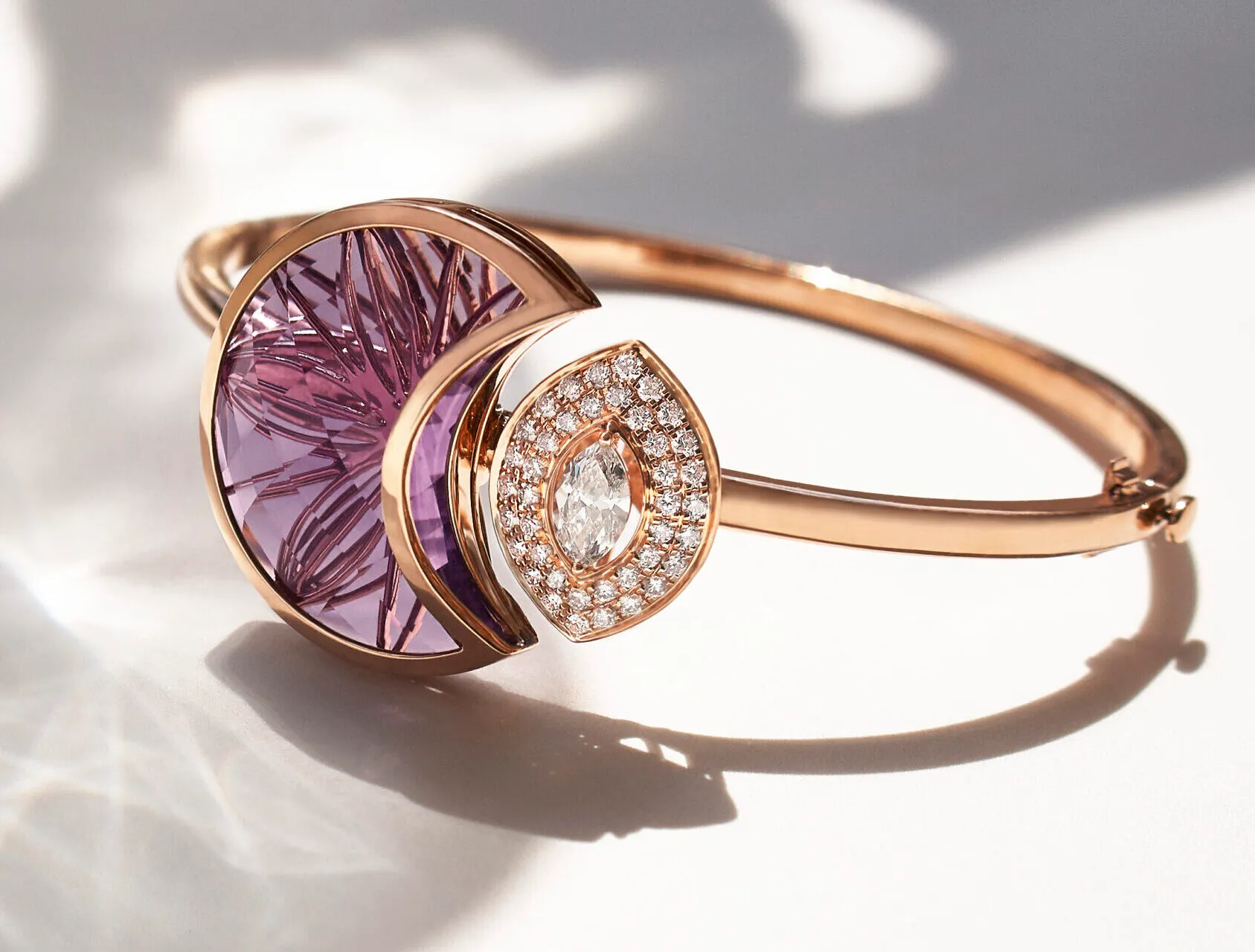  Zoya's Aeterna collection, including this bracelet, celebrates a woman's infinite potential with a signature amethyst cut and timeless motifs like the flower of life 