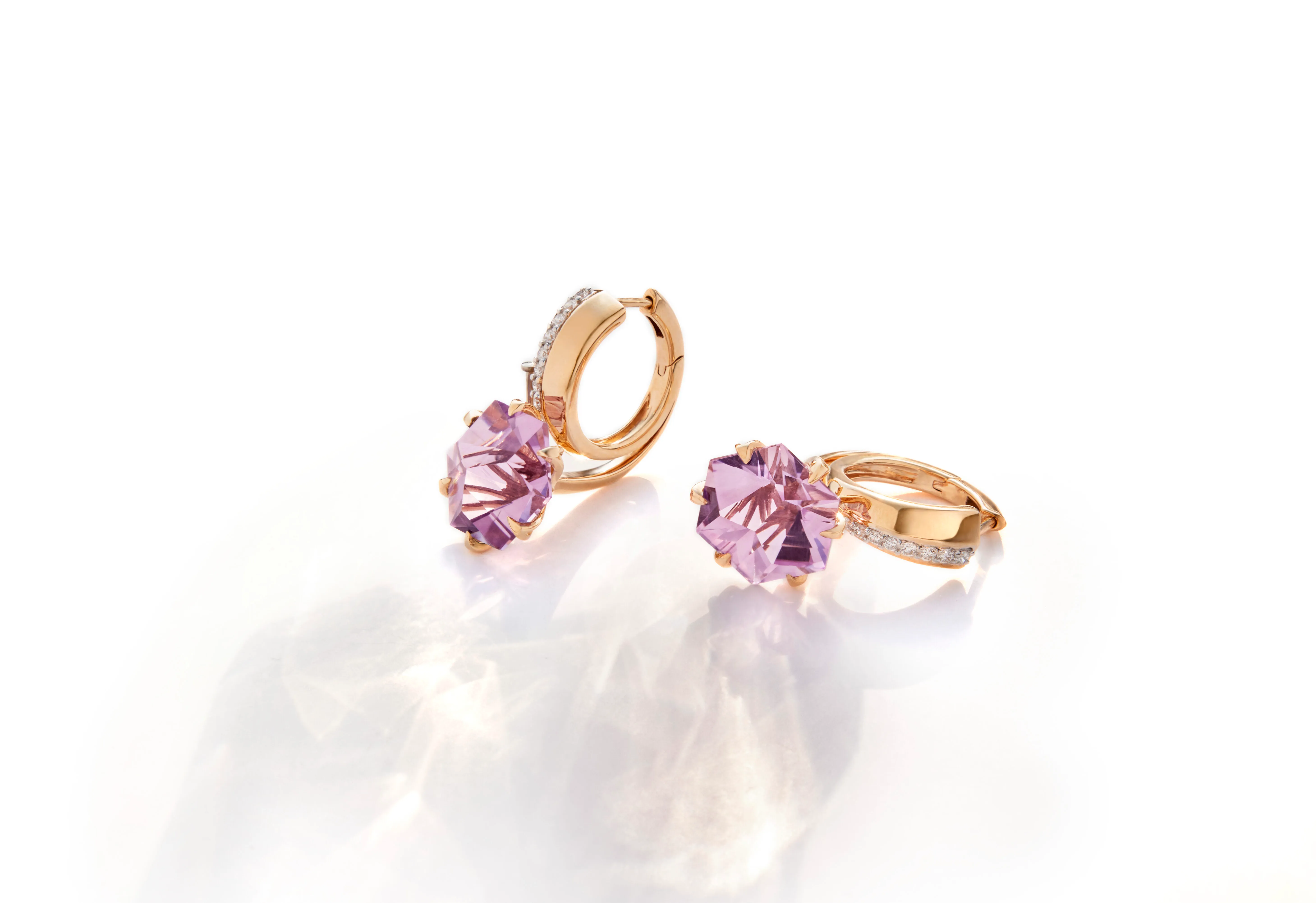 Zoya ‘Refractions of the Infinite’ earrings from the Aeterna collection with patented cut pink amethysts and diamonds in 18k yellow gold 
