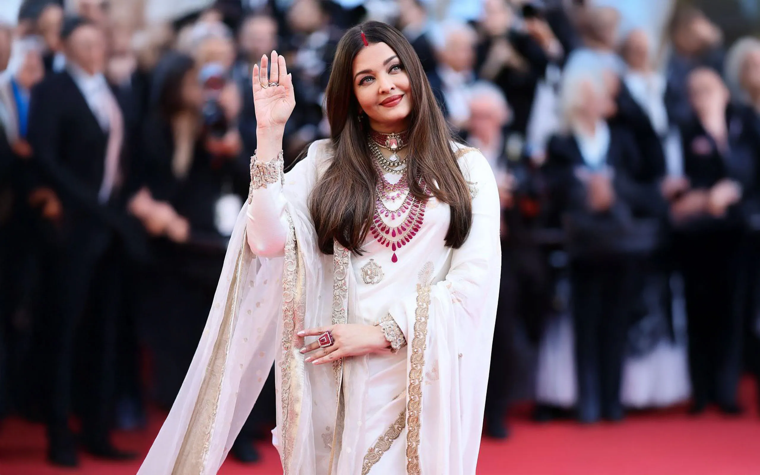 Indian actress Aishwarya Rai wears a suite of pear-shaped rubies from Manish Malhotra Jewellery to the Cannes Film Festival 2025