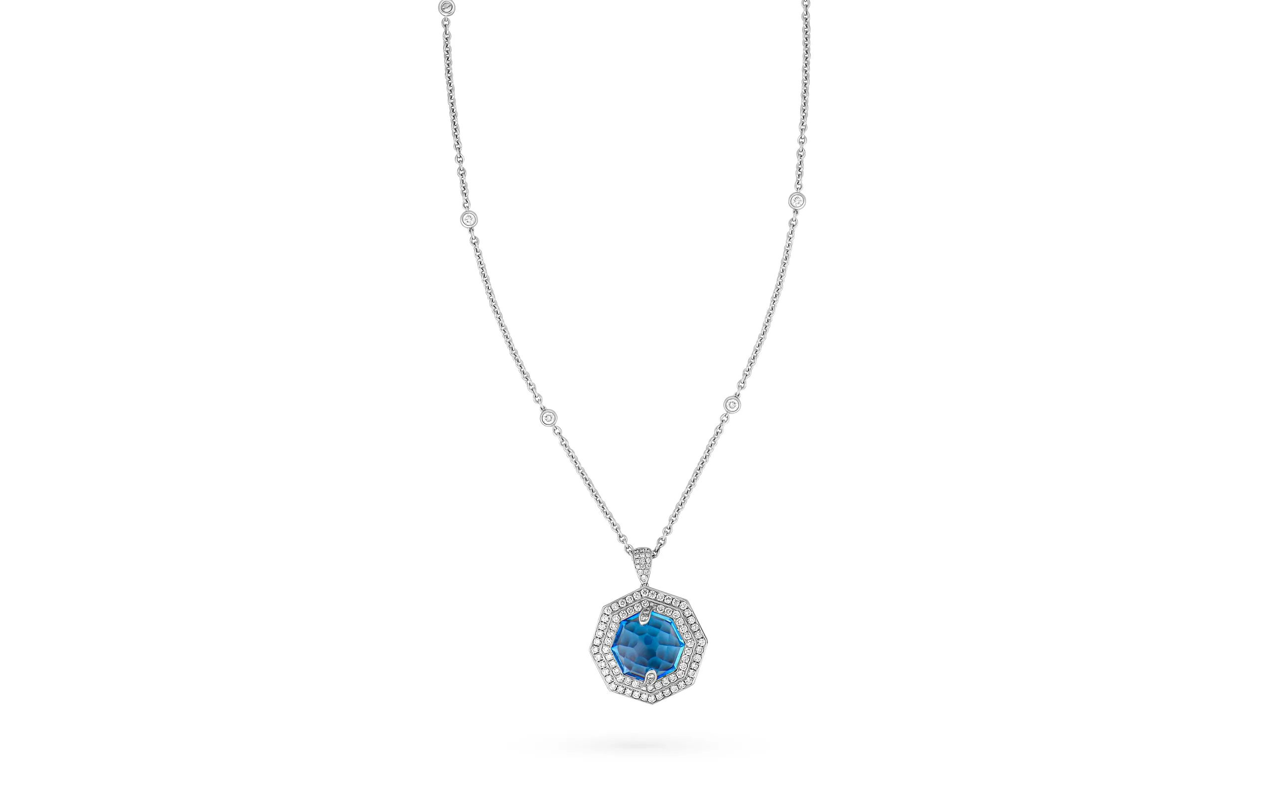 AKANO Double Halo Topaz pendant necklace with a 16.4-carat topaz, encircled by a 1.87-carat diamond double halo, set in 18K gold. Part of the Hexagon Gemstone collection