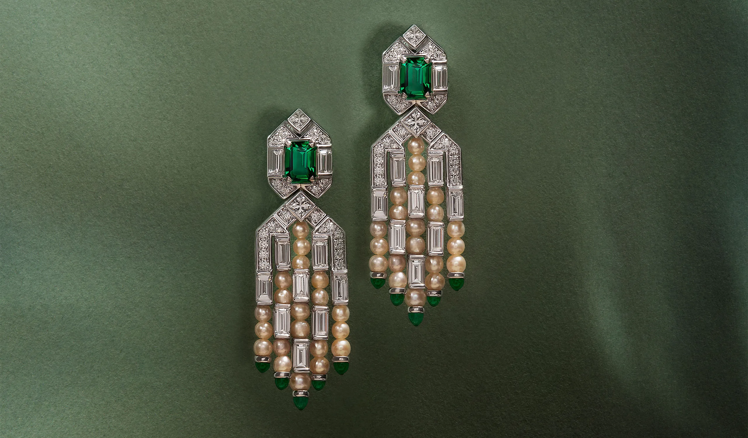 <p>Al Zain Arab Deco high jewellery earrings, set with emerald cut emeralds, diamonds and natural pearls in 18k white gold</p>