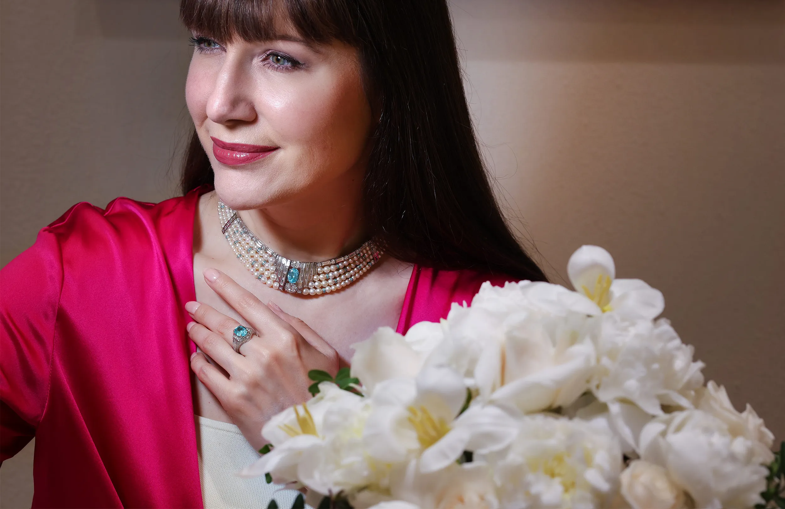 <p>Katerina wears the Arab Deco high jewellery choker and ring with Paraiba tourmalines, natural pearls and diamonds by Al Zain</p>