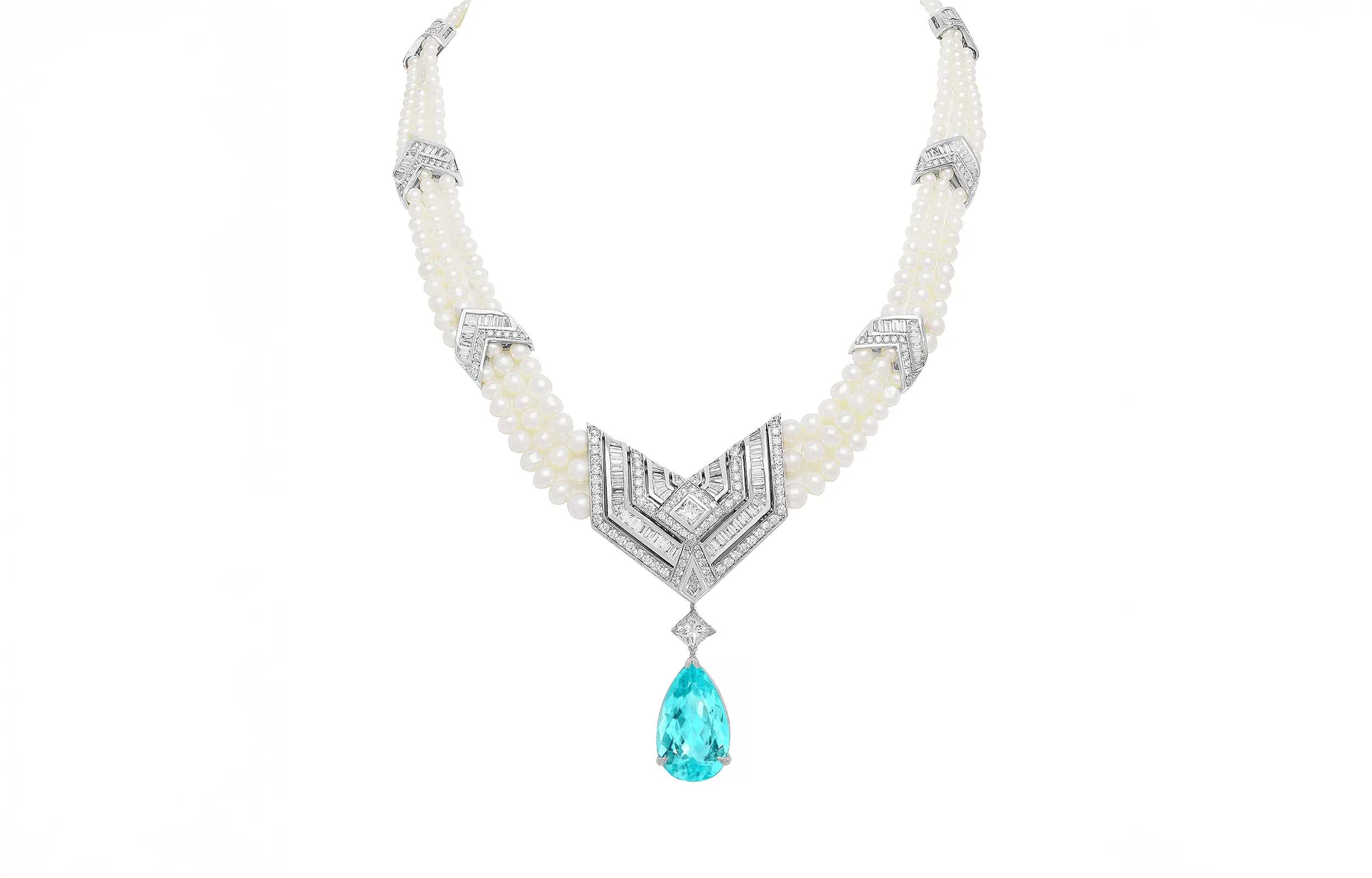 <p>The Paraiba tourmaline illuminates a design language that unites the elegance of Art Deco and the intricate patterns of Arabian architecture</p>