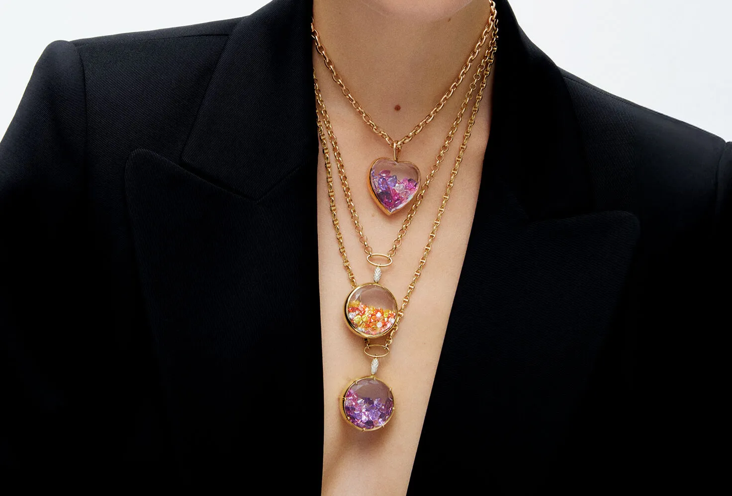 Aponine white quartz medallions from the Sparks collection filled with multi-coloured crystals in 18k gold 