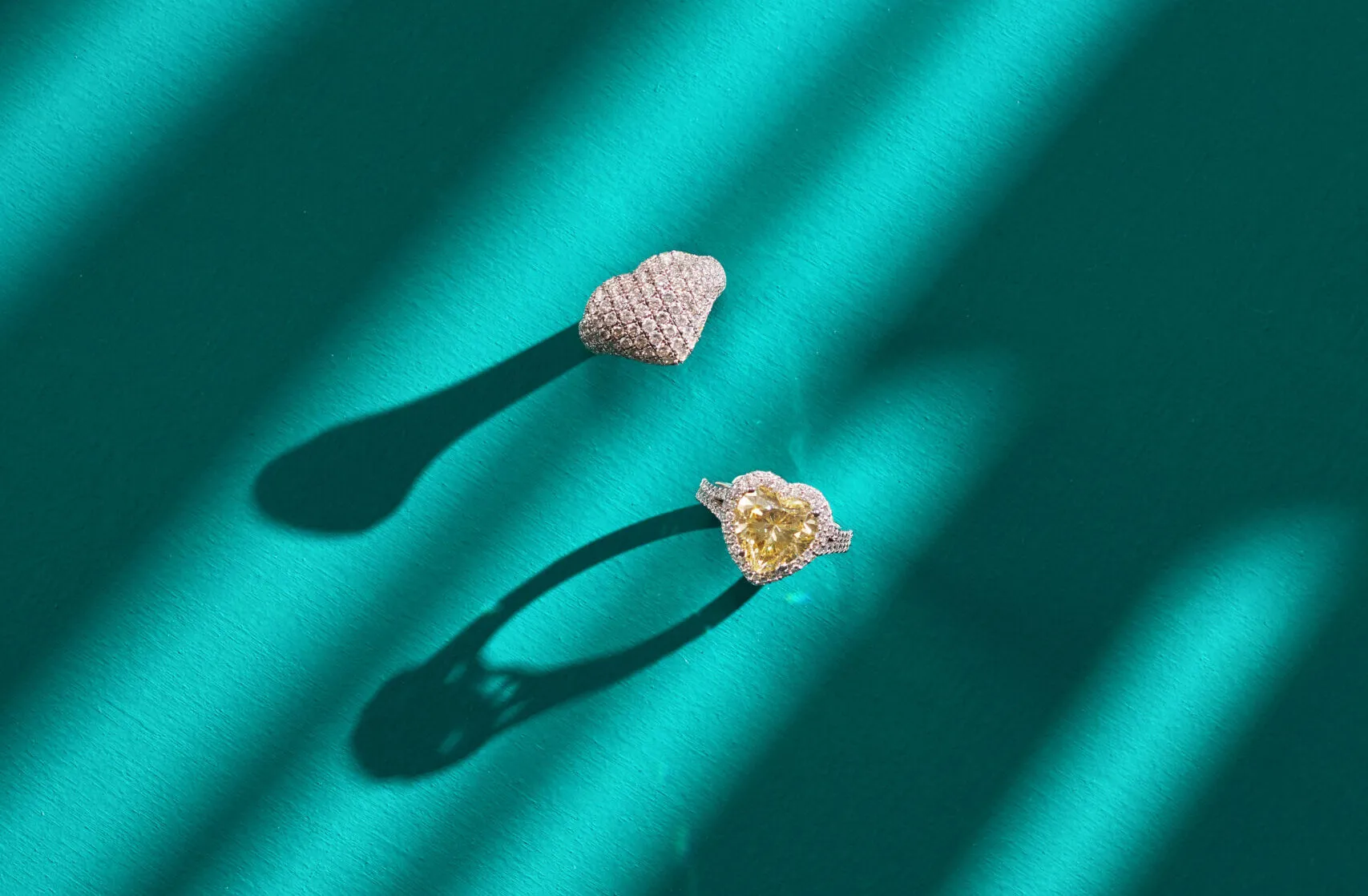 Aponine Full Heart ring (top) with 2.36 carats of diamonds, part of the Mingle collection, and a Heart Drop ring with a 6.93 carat citrine and diamonds from the Sassy Classics collection