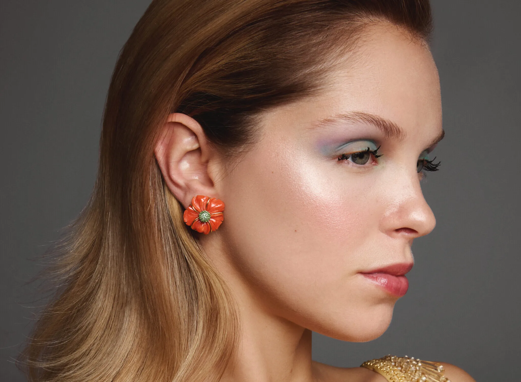 Aponine Wild earrings with 24.51 carats of carved coral and 1.31 carats of tsavorite, part of the Garden of Aponine collection