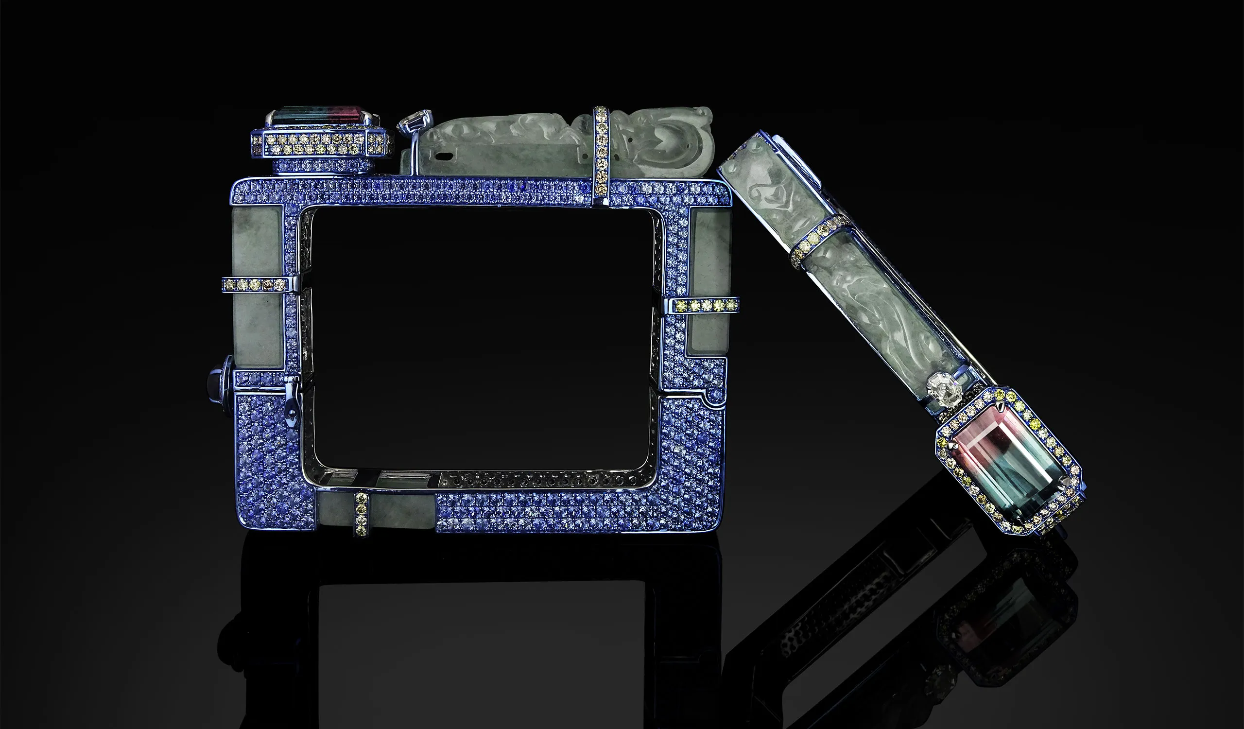 Austy Lee The Dragons’ Gate bangle from The Jade Dynasty collection with Brazilian bi-colour tourmaline, Burmese white jades, blue sapphires, fancy colour diamonds and white diamonds set in 18k white gold 