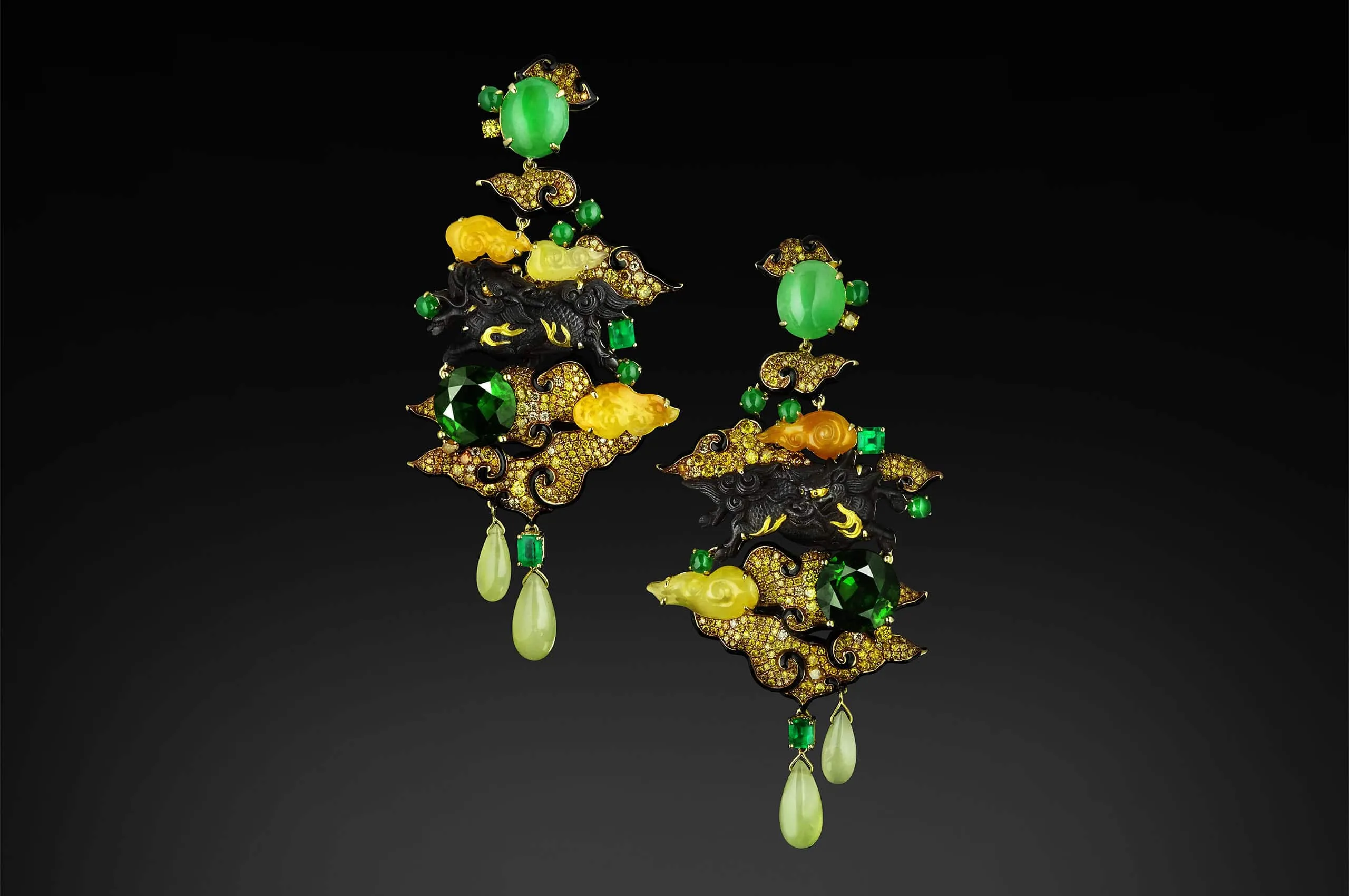 Austy Lee The Hannya Faiyākirin earrings from The Ancient Fetus Collection with antique Menuki, Brazilian green tourmalines, Colombian emeralds, jades, black enamel, and diamonds