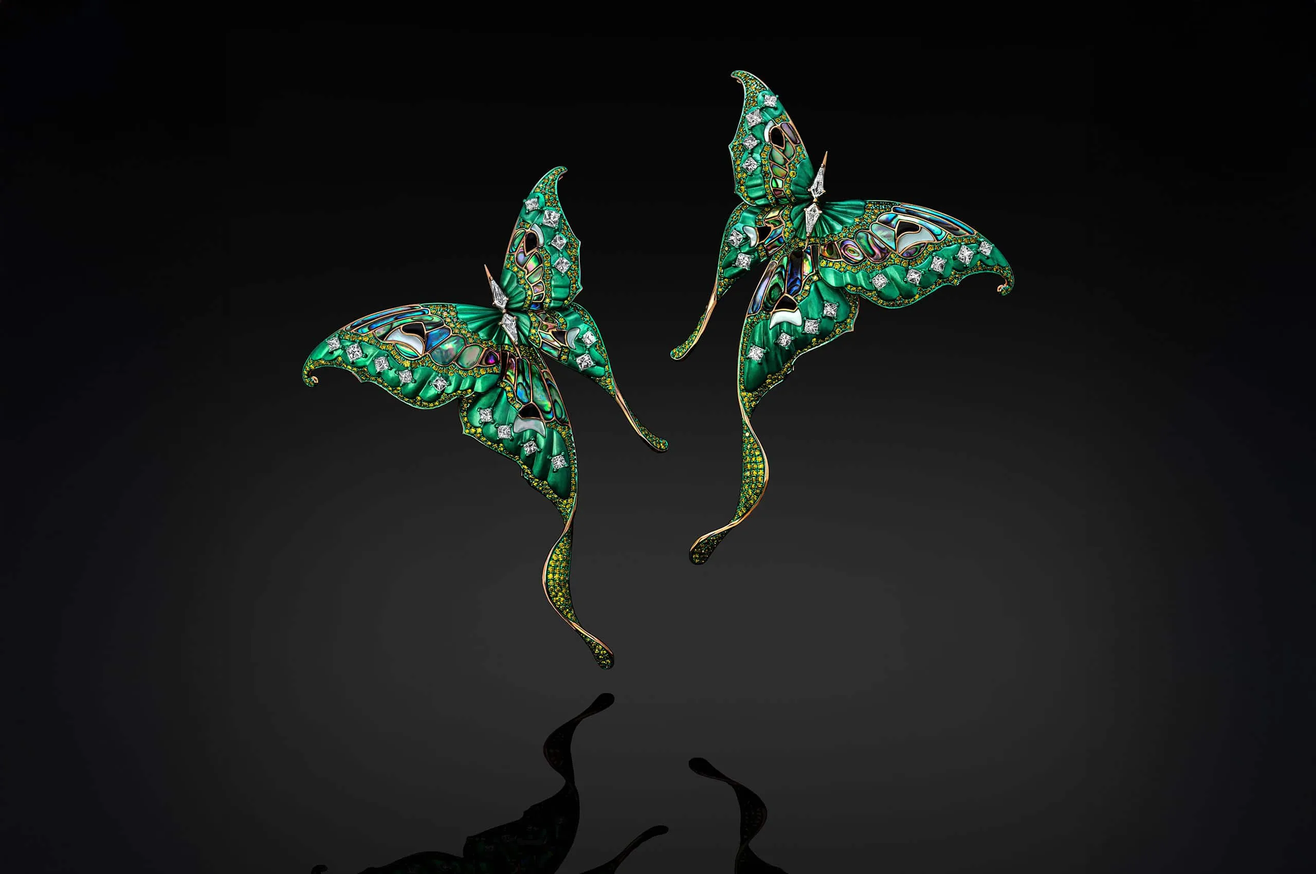 Austy Lee The Lunar Moth earrings from The Ītzpāpālōtl Collection with diamonds, abalone shell, and mother-of-pearl