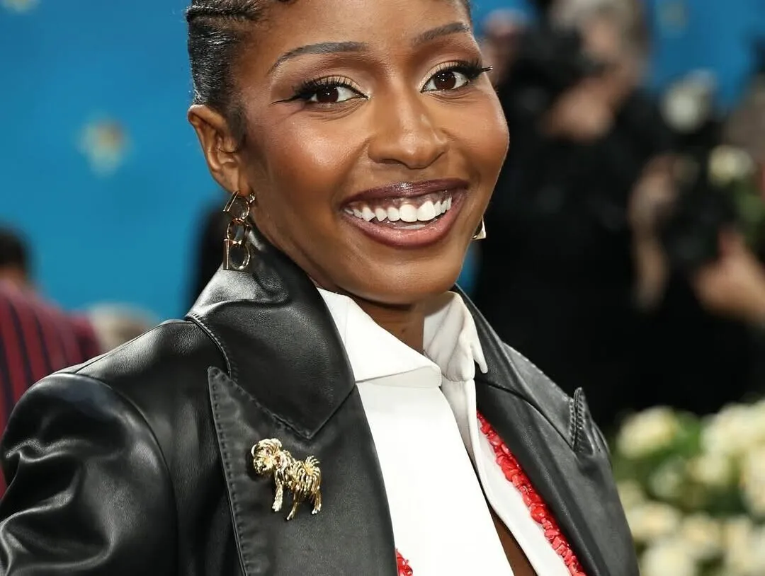 Actress Ayo Edebiri opted for custom Ferragamo, accessorised with whimsical brooches by Cartier
