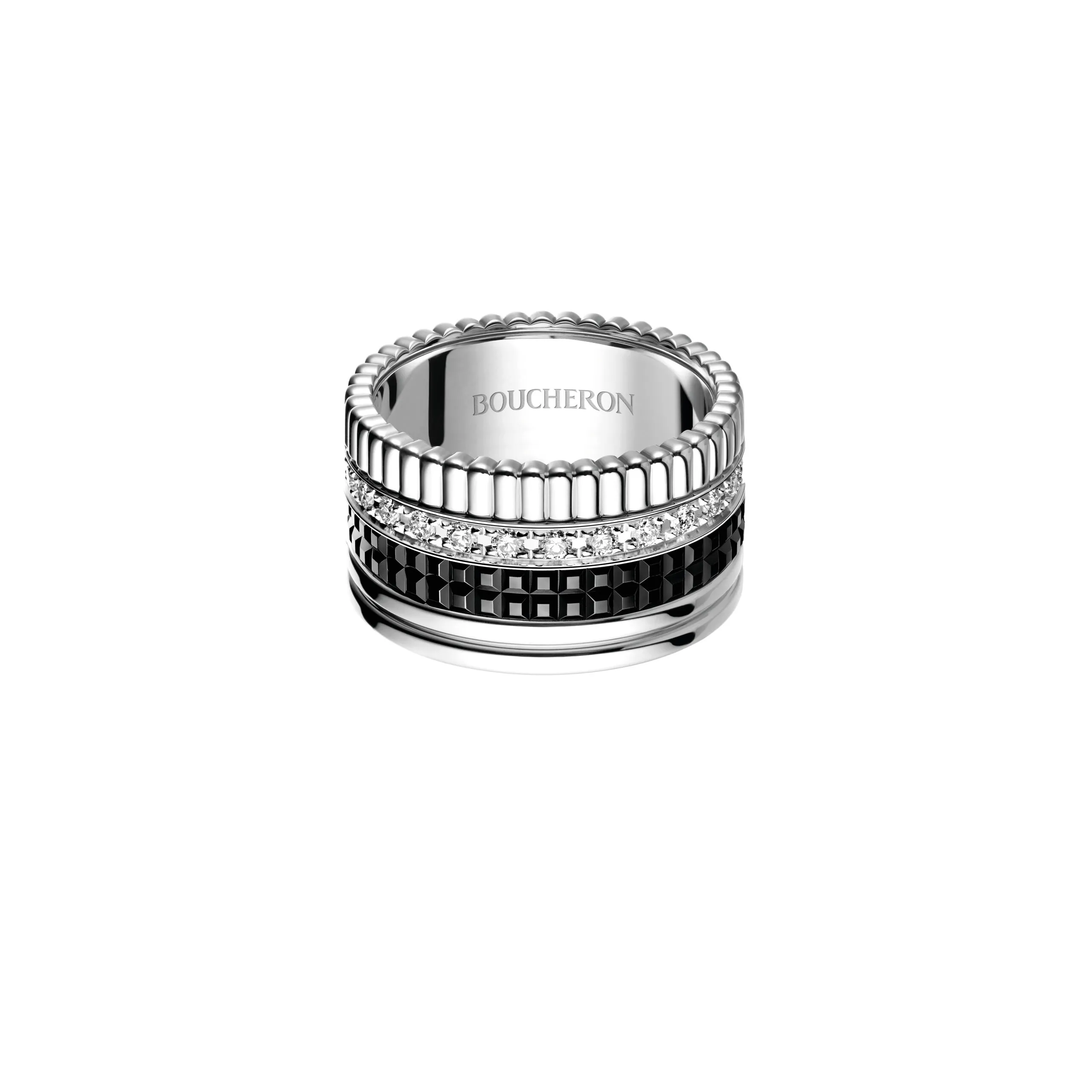 He also added this Boucheron Quatre ring into the mix