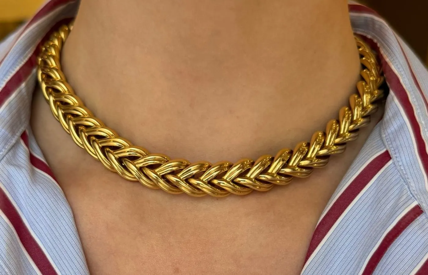 Vintage Boucheron braided colour in 18 carat yellow gold, crafted in 1970. Available at Kentshire.