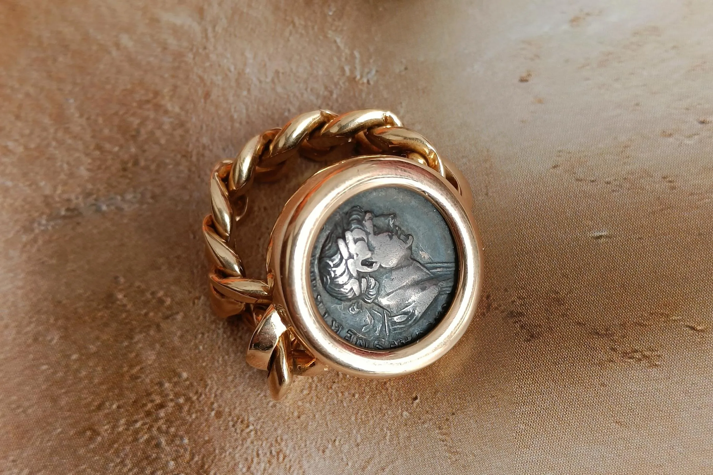 <p>Bulgari &#8216;Monete&#8217; Gold Ring with antique silver coins</p>
