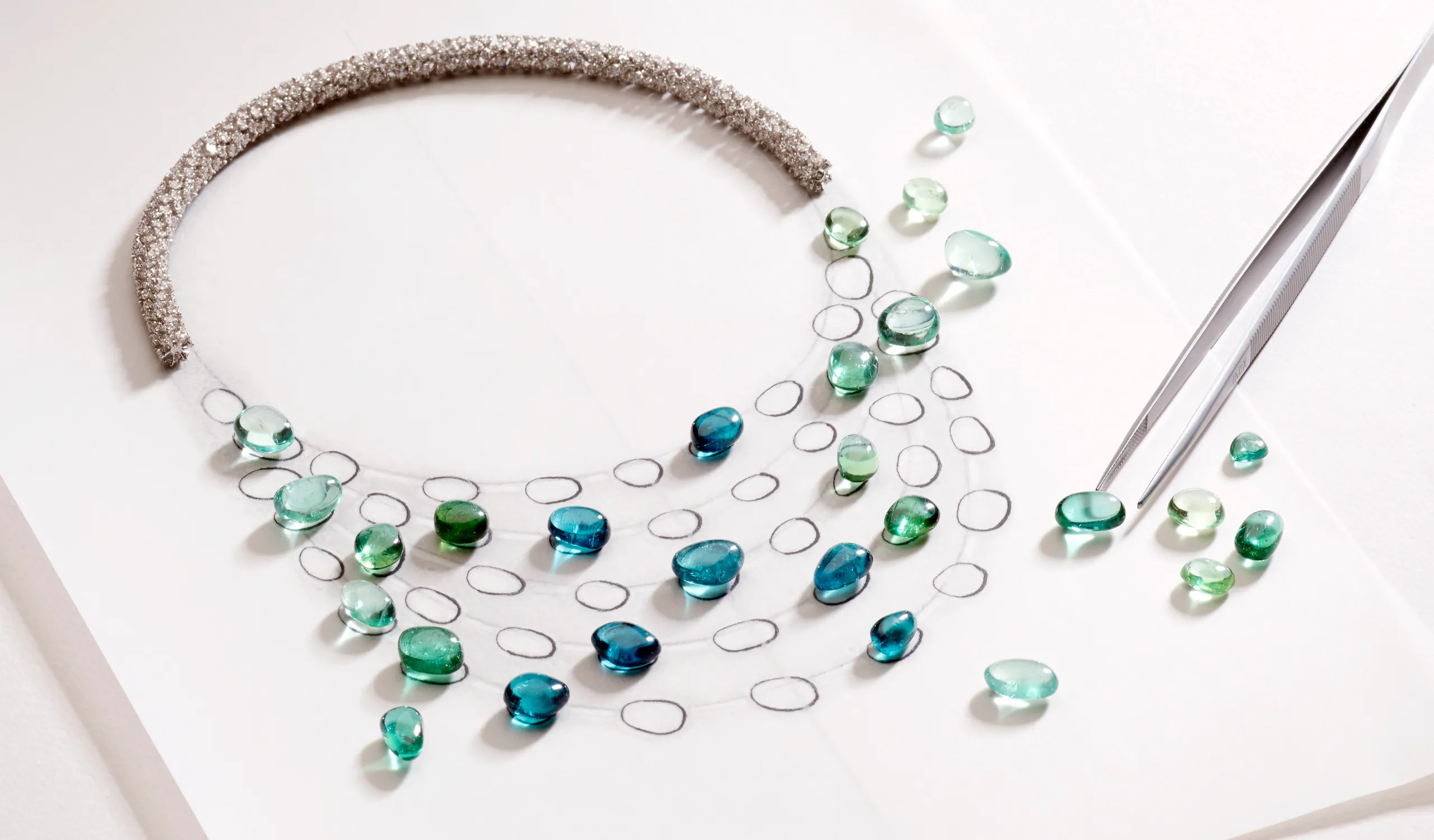Composing the colour palette of the Pomellato Lagoon Bavarole necklace with 47 irregular cut green tourmalines on a diamond pavé-set rope chain, part of the 'Collezione 1967' High Jewellery collection