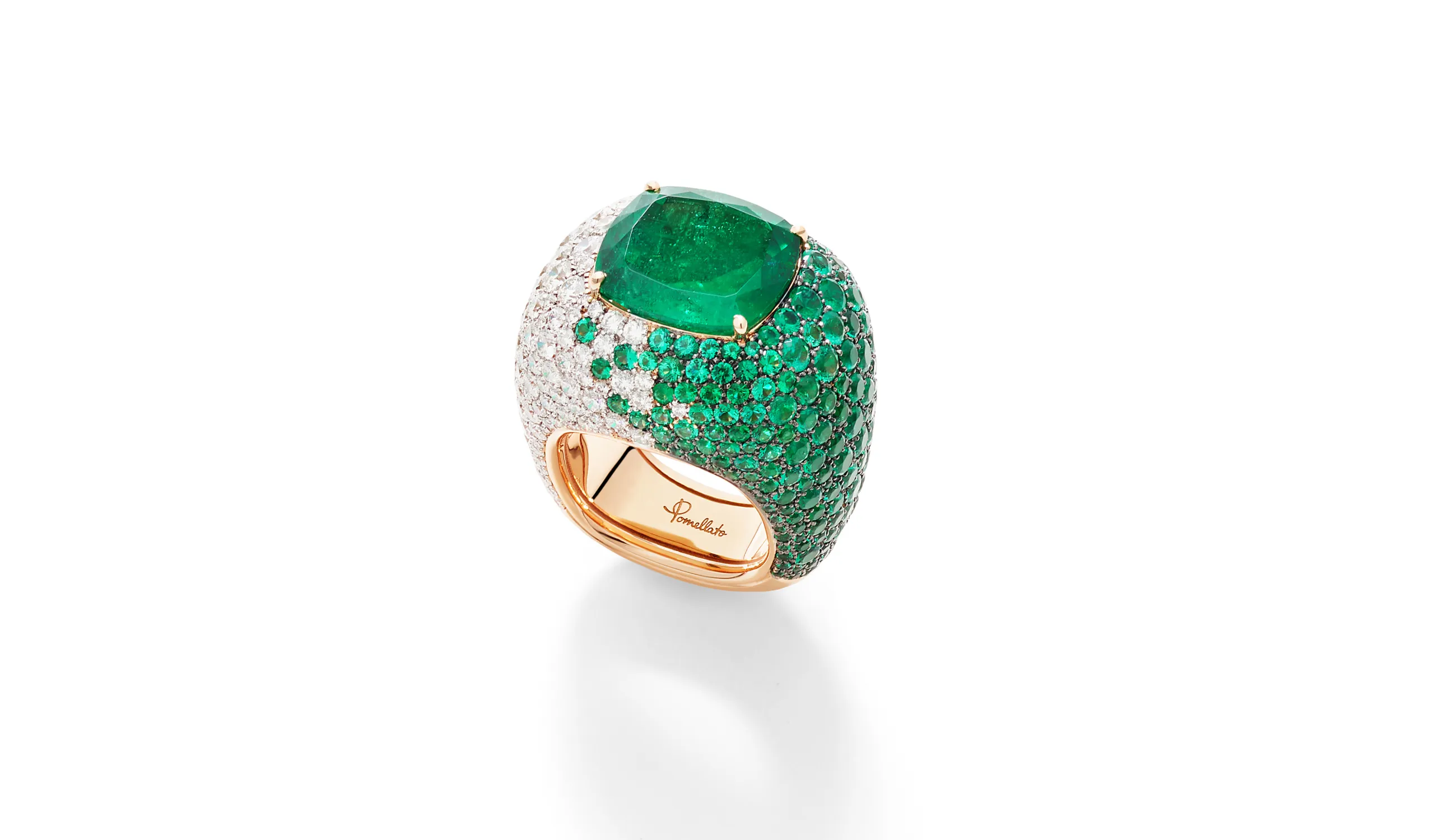 Pomellato Iconica Extreme ring with a 12.27-carat cushion-cut emerald, enhanced with further emeralds and diamonds in a pavé setting, part of the 'Collezione 1967' High Jewellery collection