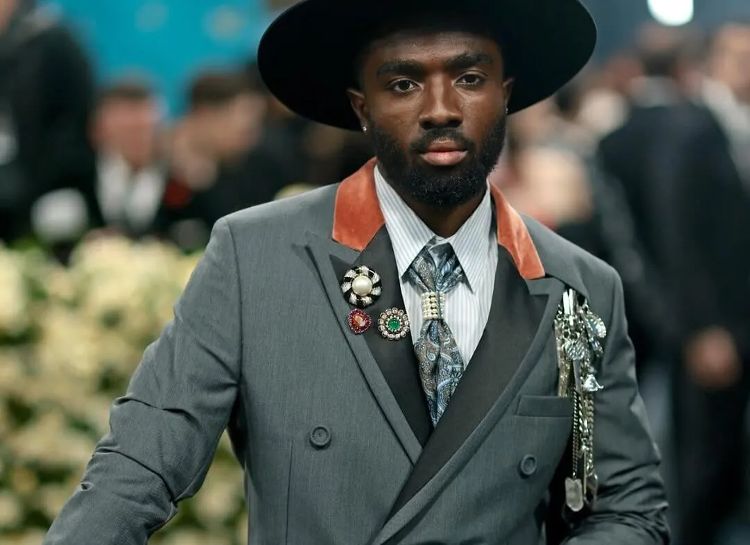 Caleb McLaughlin also piled on the brooches: a trip of vintage designs from Joseph Saidian and Sons