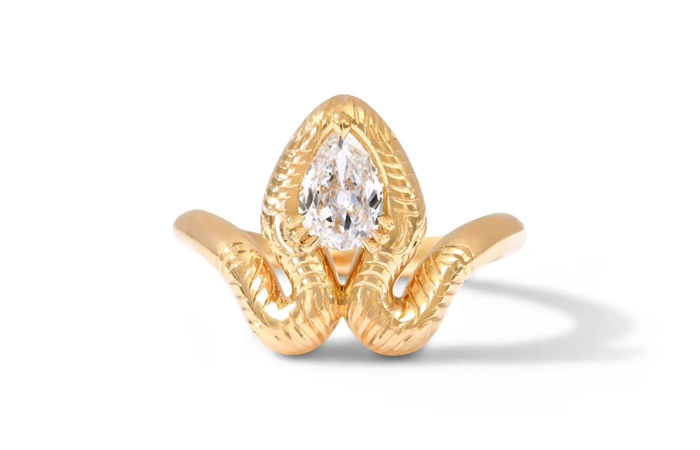 Capucine H Eyelash Viper ring with an antique pear-shaped diamond, set in 18k recycled gold with hand engraving