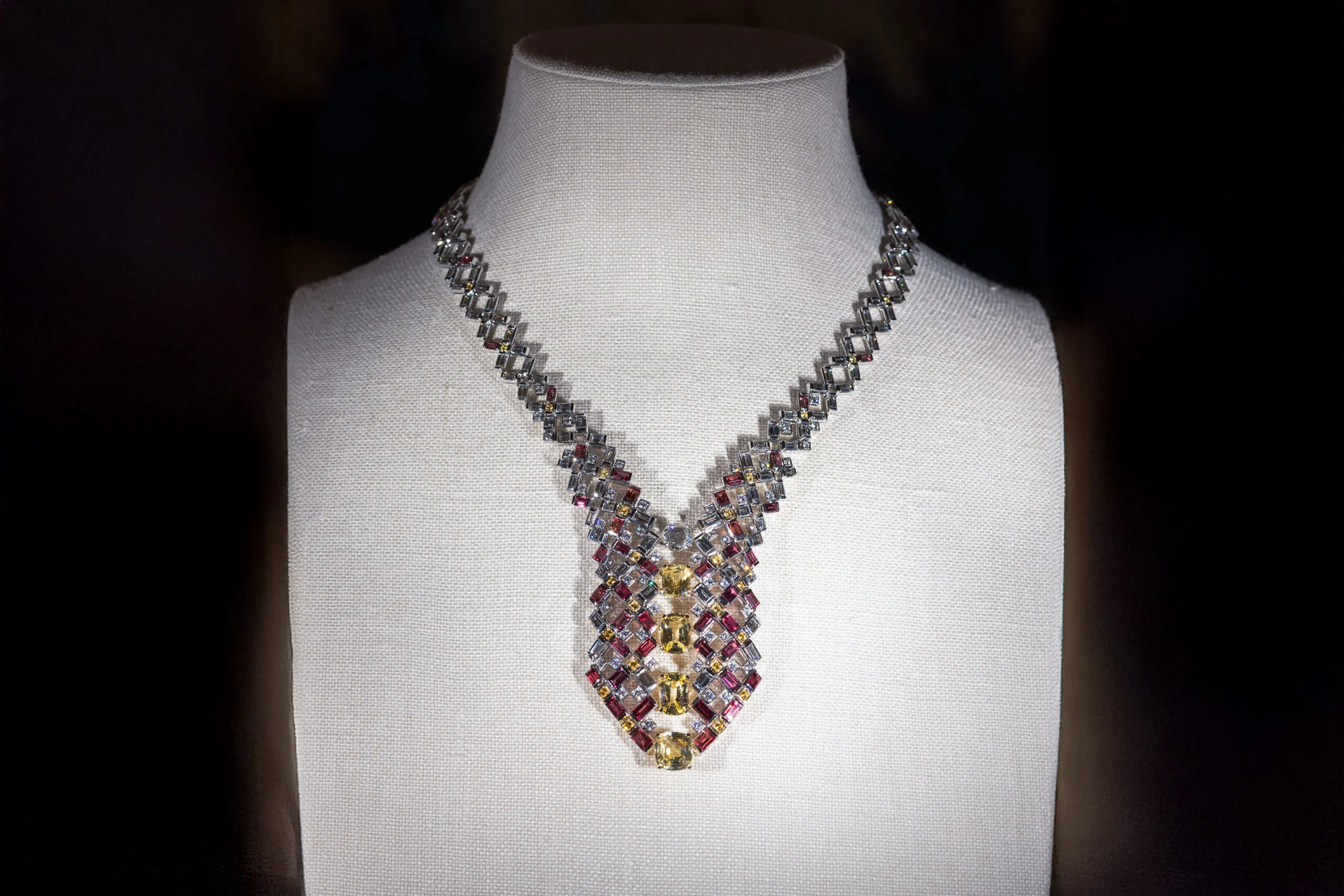 Cartier necklace with five cushion and oval-shaped yellow sapphires and one 1.02-carat modified round-shaped rose-cut diamond set in 18k white and yellow gold, part of the En Équilibre High Jewellery collection