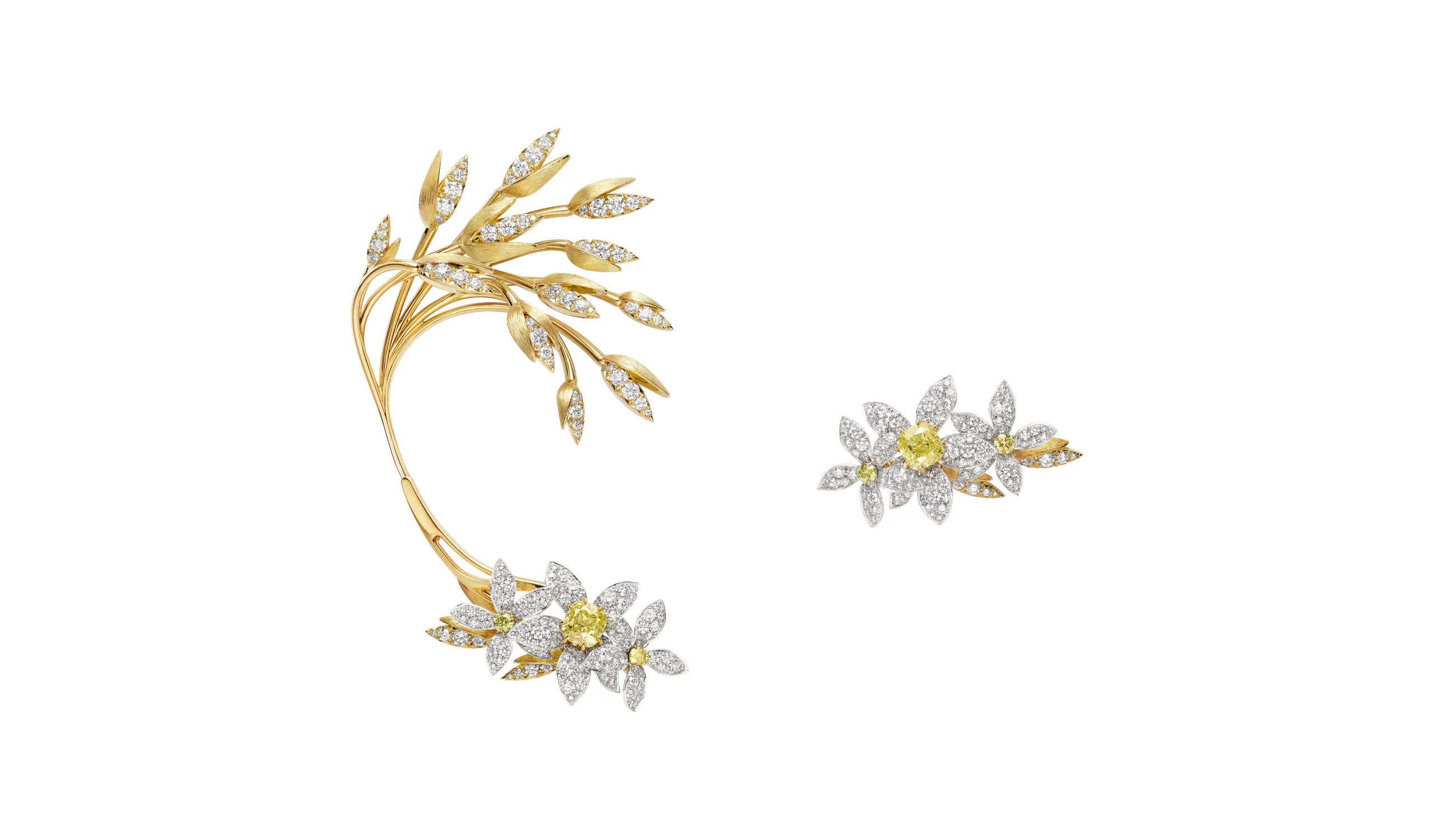 The transformable Oat and Field Star high jewellery earrings. The cuff element can be removed, creating a matching pair of ear climbers