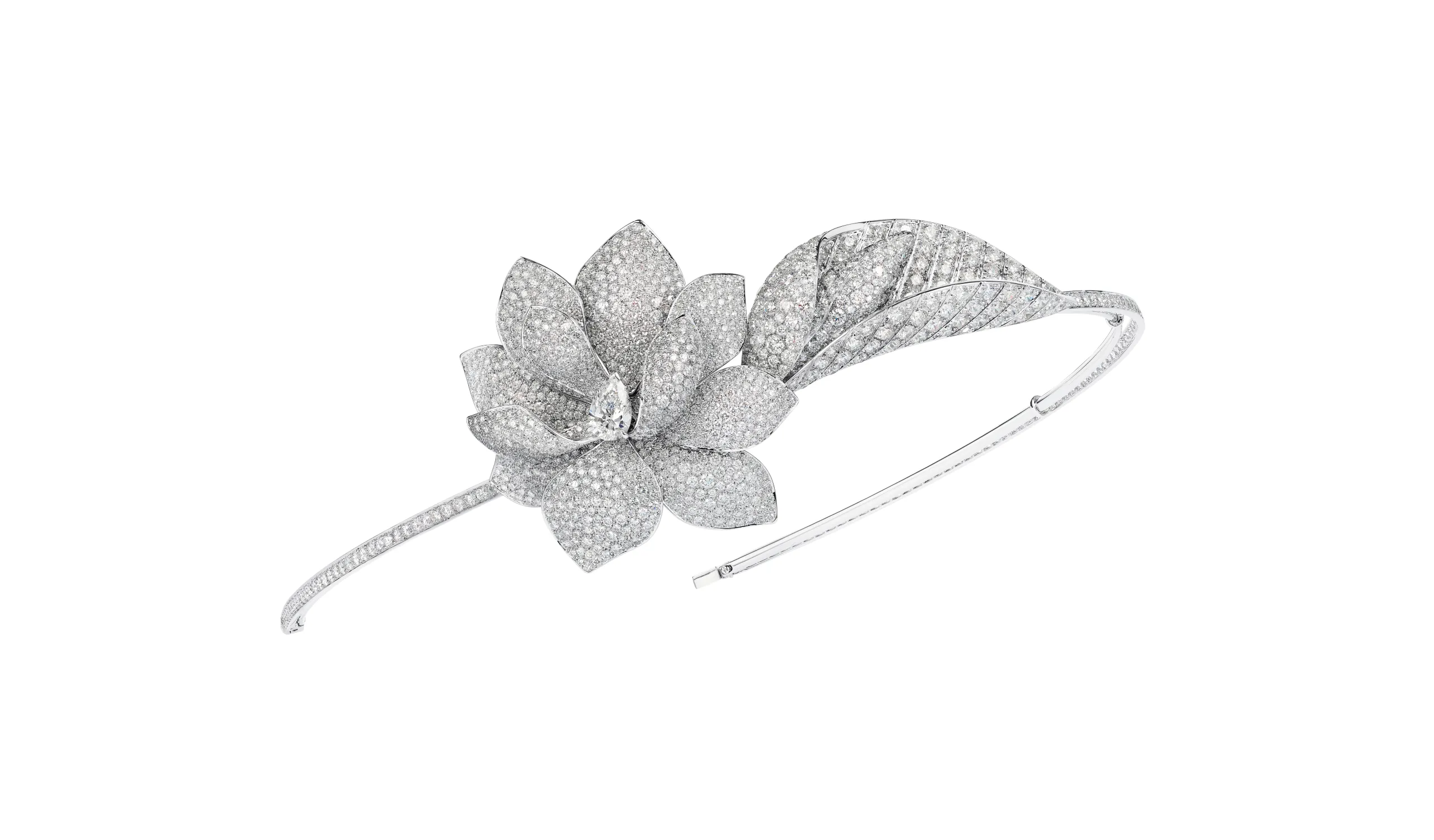The contemporary Magnolia Grandiflora tiara is designed to be worn off-centre, like a bandeau
