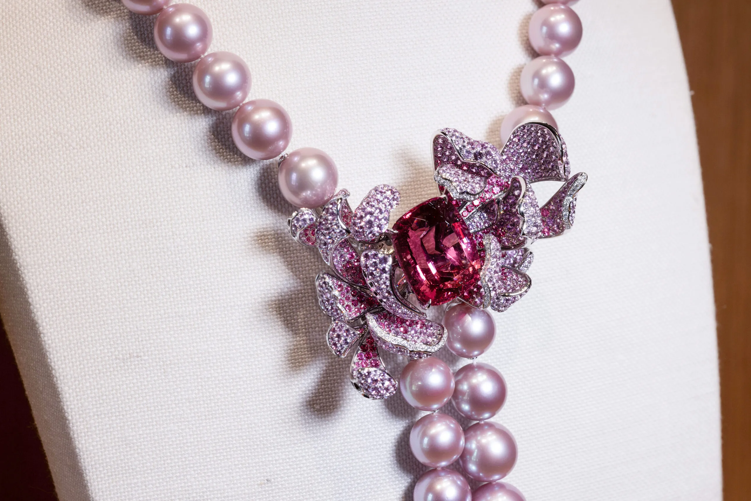 The 44.23 carat cushion-cut spinel is deep pink in hue, shot through with a hint of violet