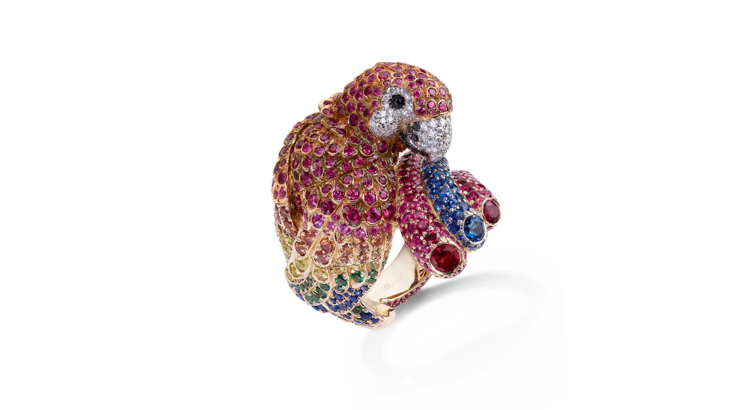 Chopard Parrot ring with 4.92 carats of brilliant-cut rubies, 2.84 carats of multi-coloured sapphires, white and black diamonds, garnets and onyx cabochons set in 18k rose and white gold, part of the Caroline's Universe Red Carpet High Jewellery Collection 2025
