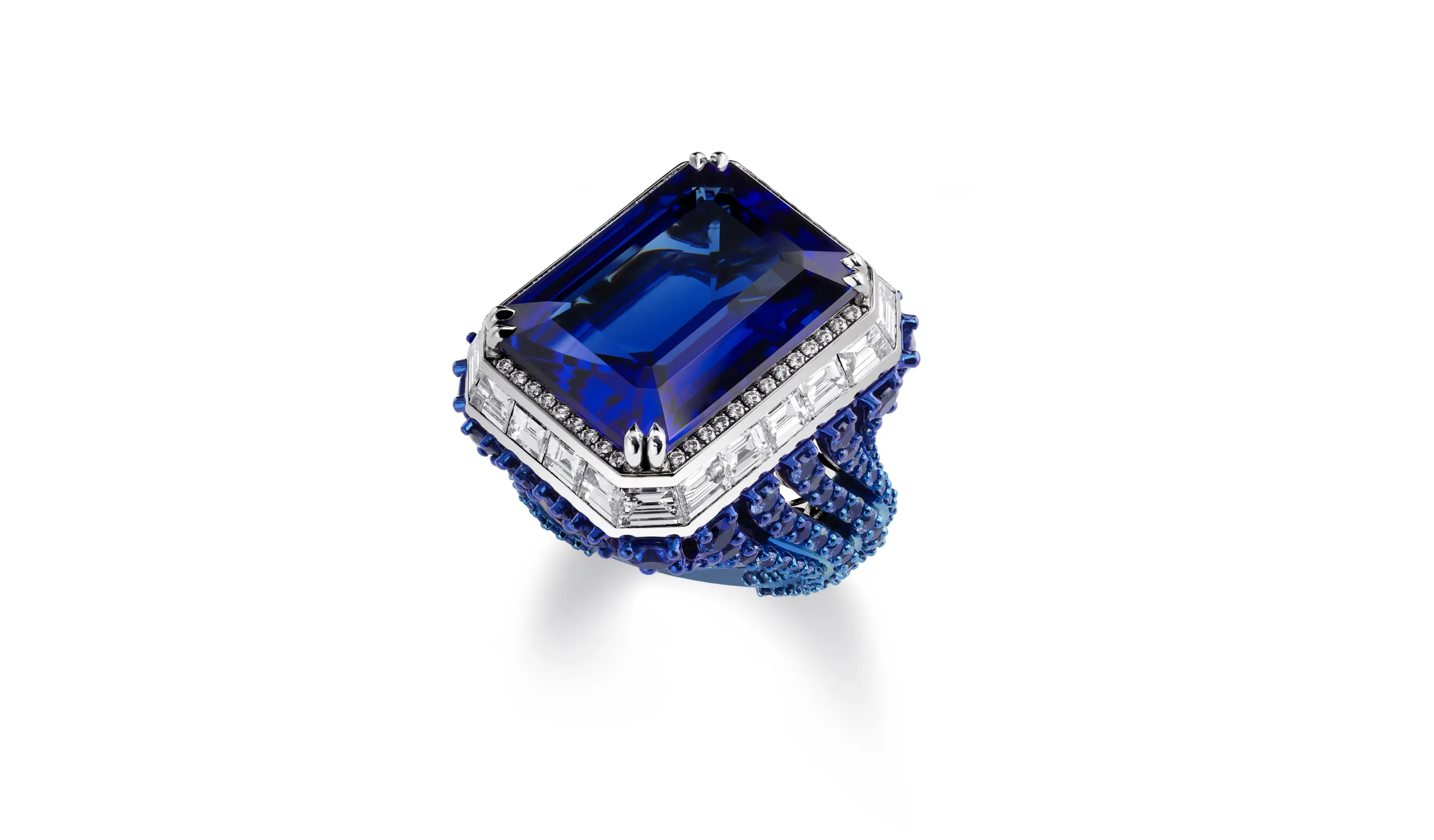 Chopard ring with a 29.76-carat emerald-cut tanzanite, 6.73 carats of brilliant-cut sapphires, 4.70 carats of baguette-cut diamonds and further diamond brilliants, set in 18k white gold and titanium, part of the Caroline's Universe Red Carpet High Jewellery Collection 2025