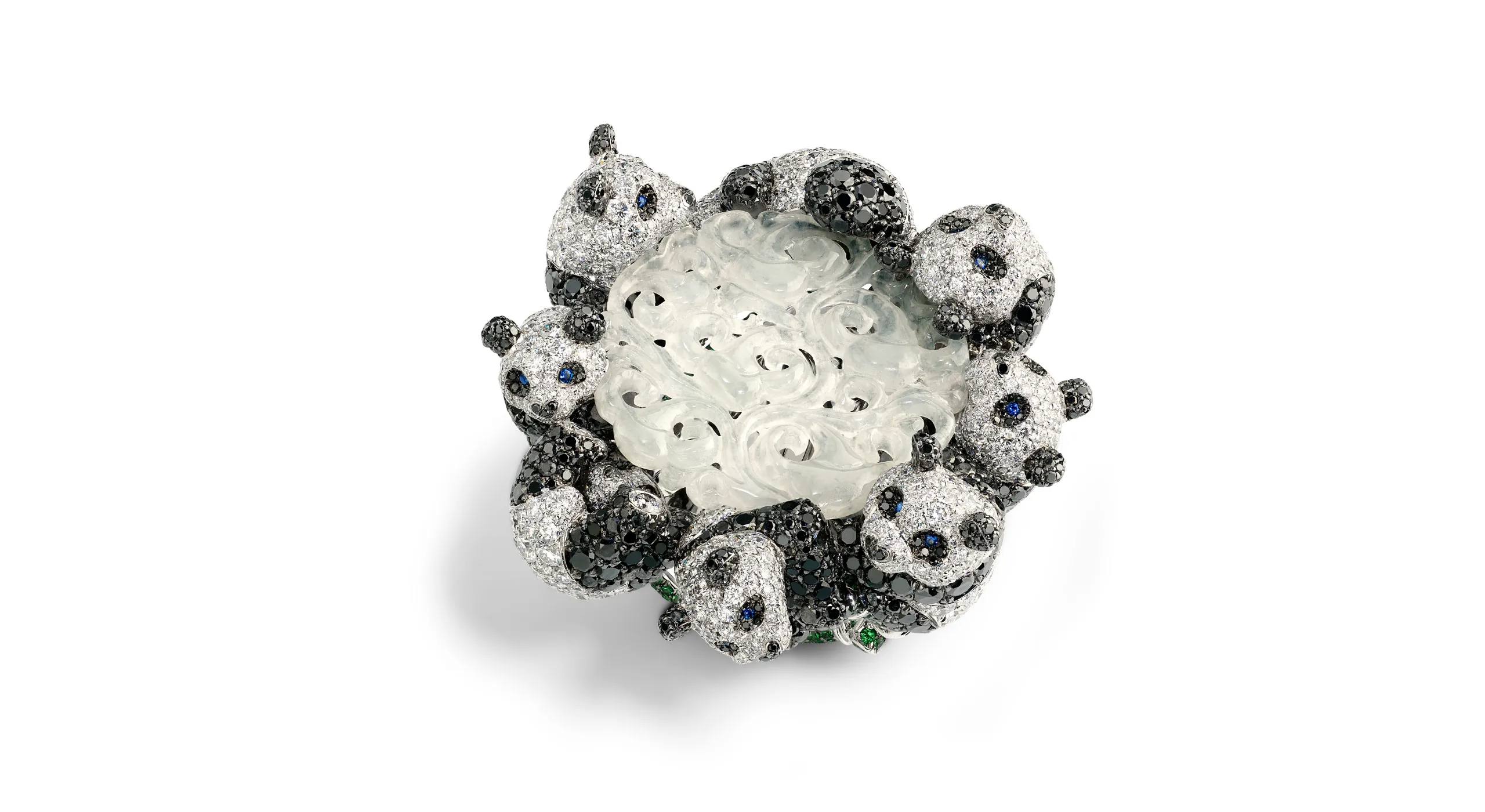 Chopard ring with a piece of sculpted jadeite surrounded by 18k white gold pandas set with brilliant-cut diamonds of 7.13 carats, black diamonds of 6.32 carats, brilliant-cut tsavorites and sapphires, part of the Caroline's Universe Red Carpet High Jewellery Collection 2025