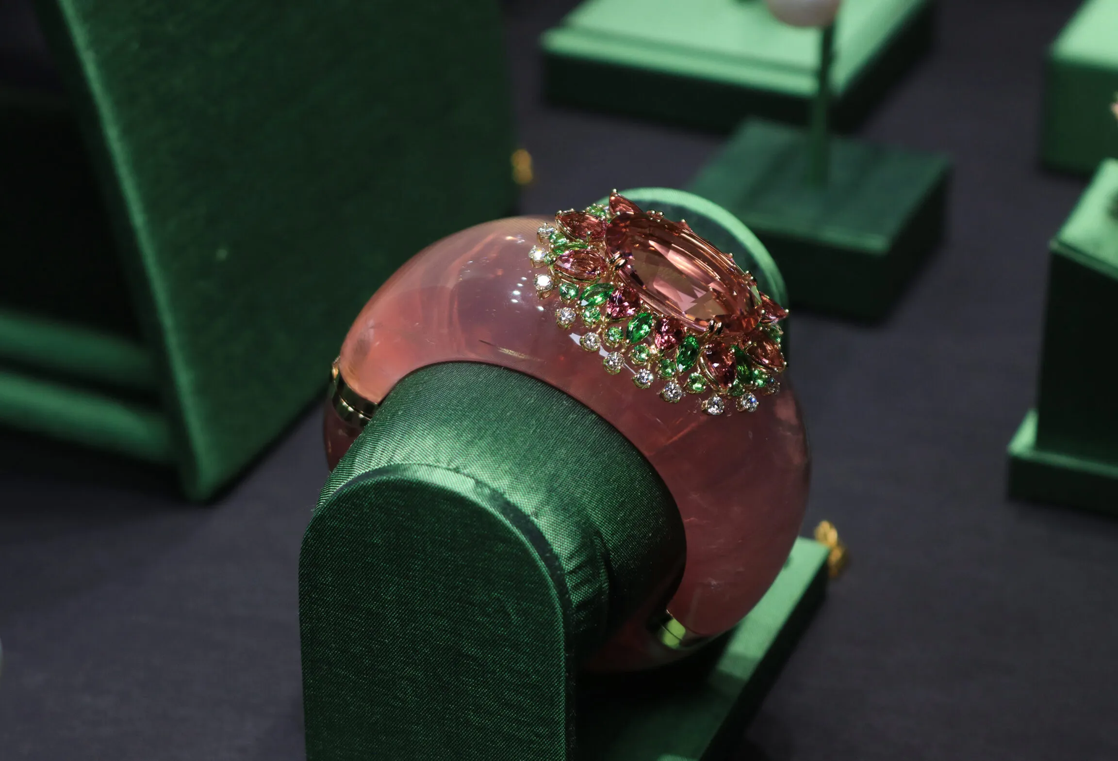 Margot McKinney Coral Cay cuff crafted from 1,097.75 carats of rose quartz and 18k yellow gold, set with a 43.04 carat pink tourmaline, diamonds, further pink tourmalines and tsavorites