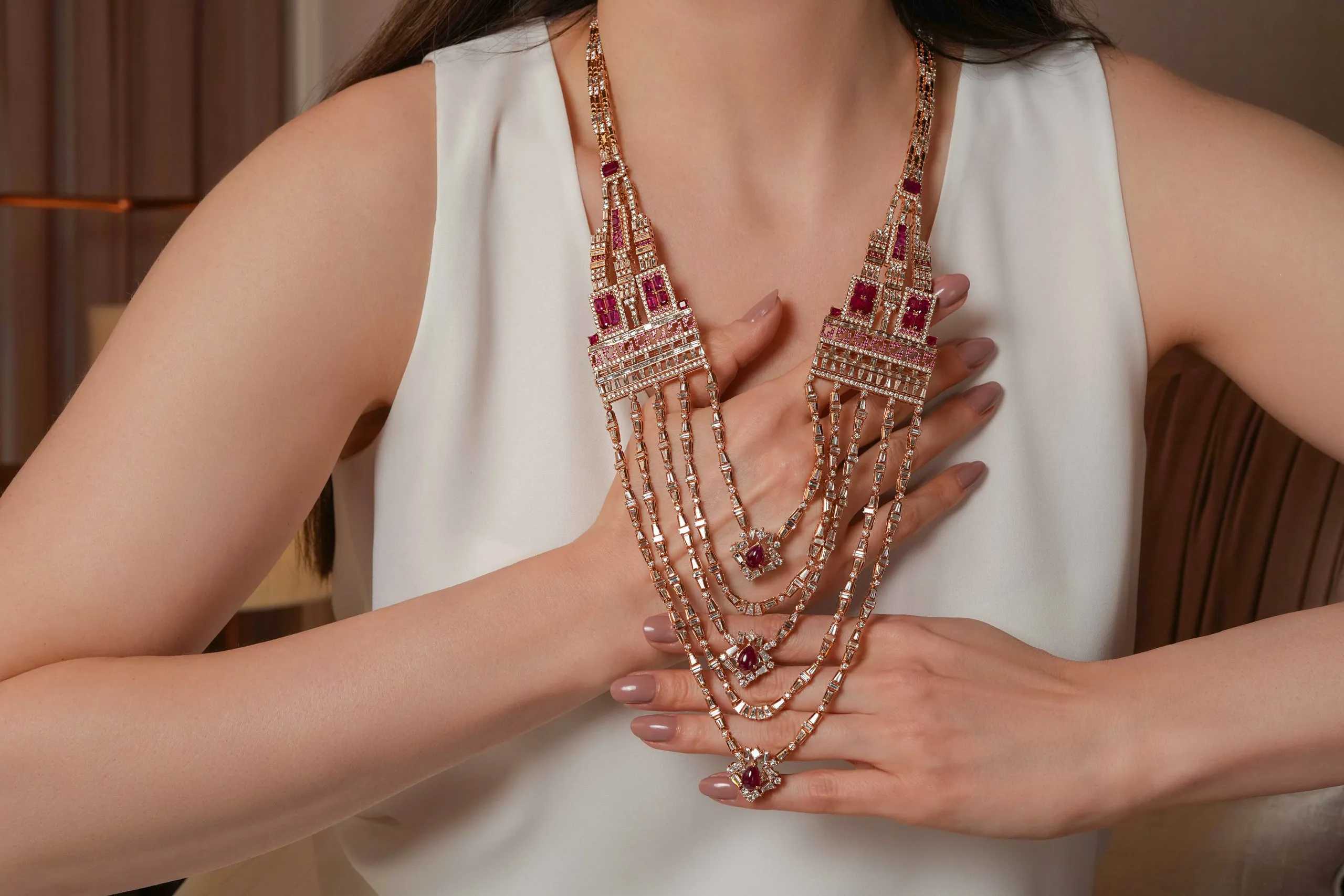 Katerina Perez wears an iconic necklace by Indian Maison Zoya
