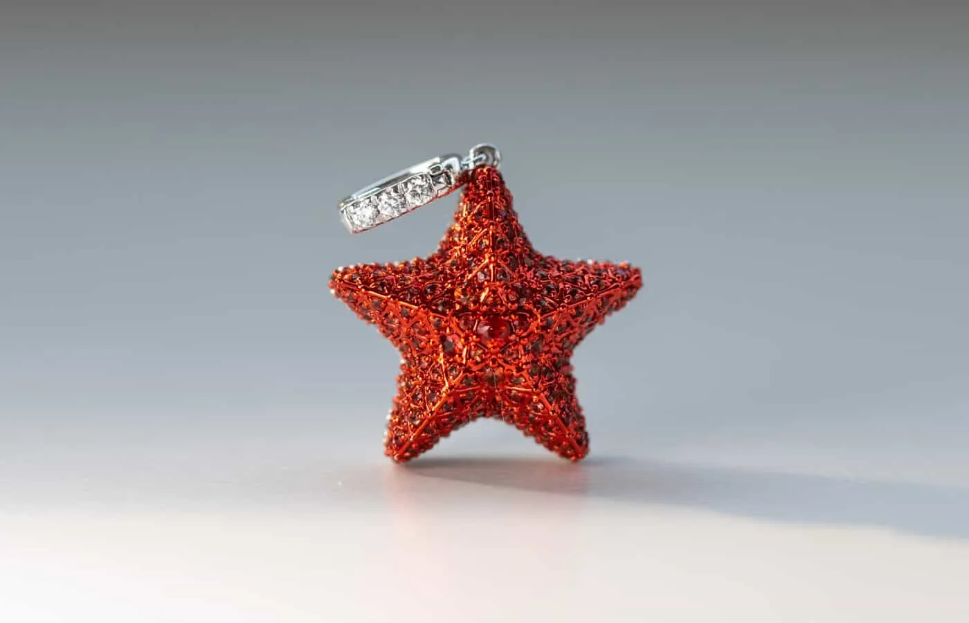 Valentina Fine Jewellery double-sided Starfish pendant with orange sapphires and red rhodium plating in 18k white gold 
