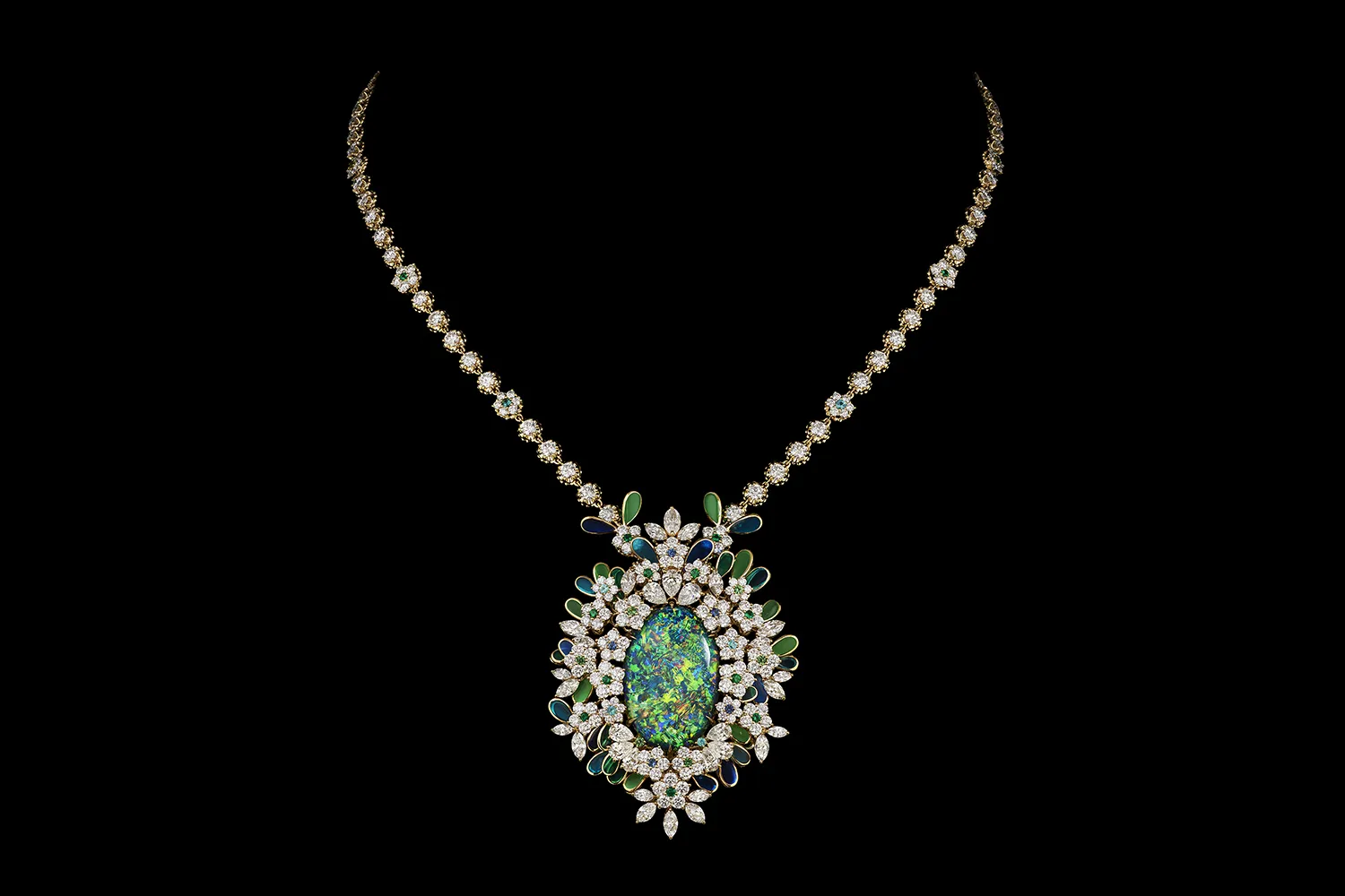 A detachable pendant necklace from the Diorexquis High Jewellery collection with an oval-shaped opal surrounded by diamonds and coloured gemstones 