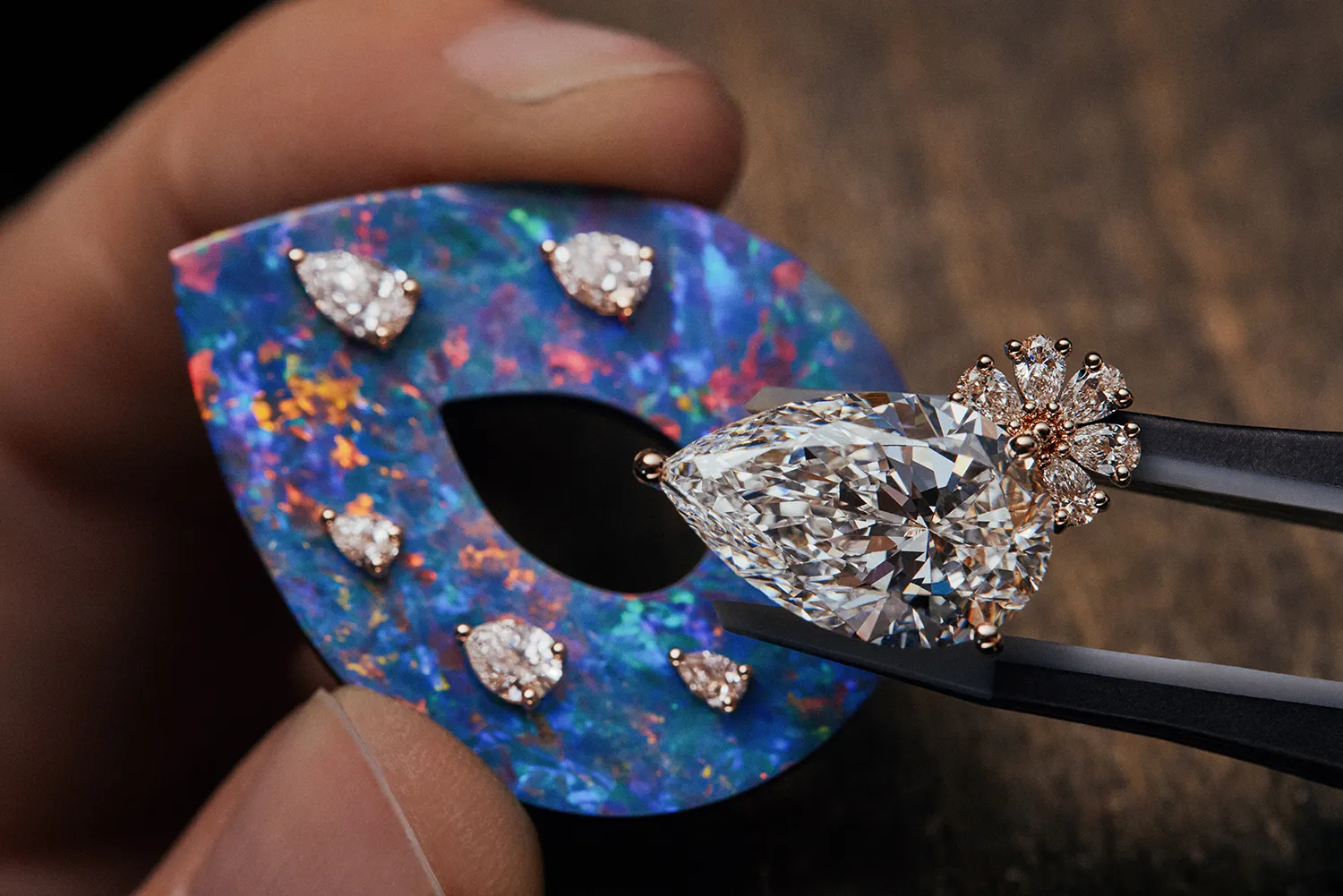 The Diorexquis Nature Precieuse High Jewellery necklace features a large pear-shaped diamond accent inlaid into precious opal. Photo credit Piotr Stoklosa