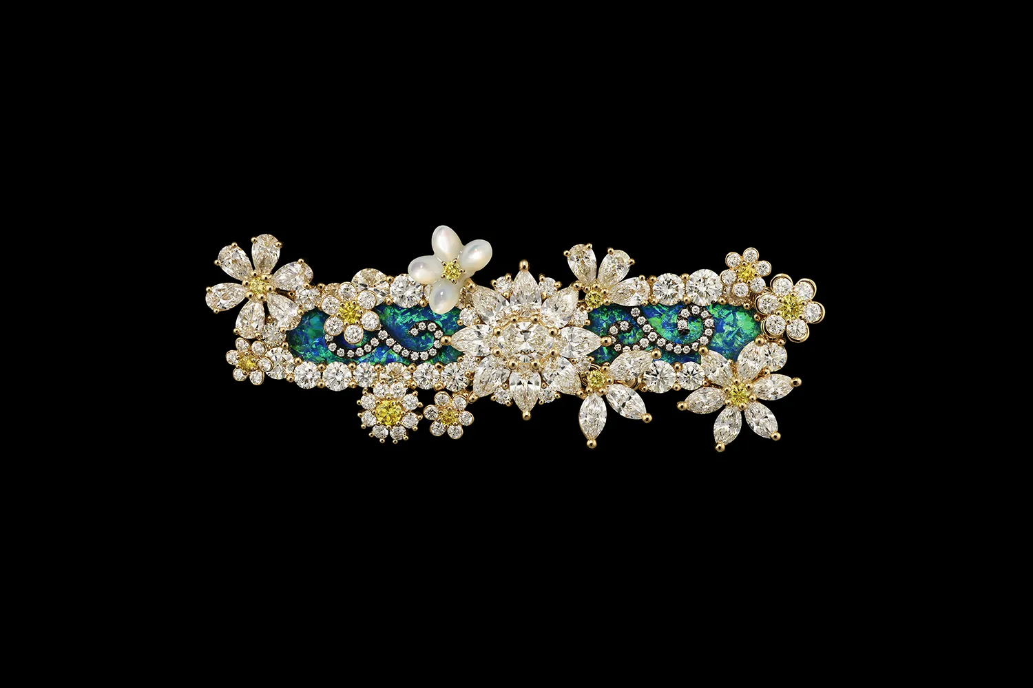 A new piece from the Diorexquis High Jewellery collection by Victoire de Castellane with a central diamond-set flower on a backdrop of opal