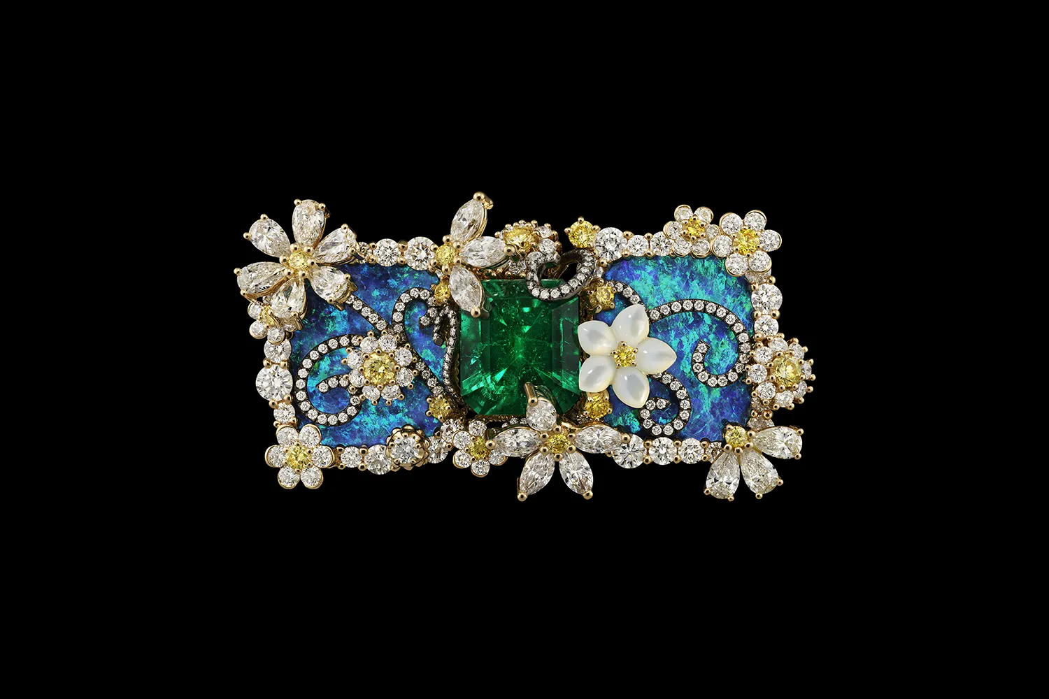 A creation from the Diorexquis High Jewellery collection by Victoire de Castellane with a central emerald surrounded by opal and diamonds 