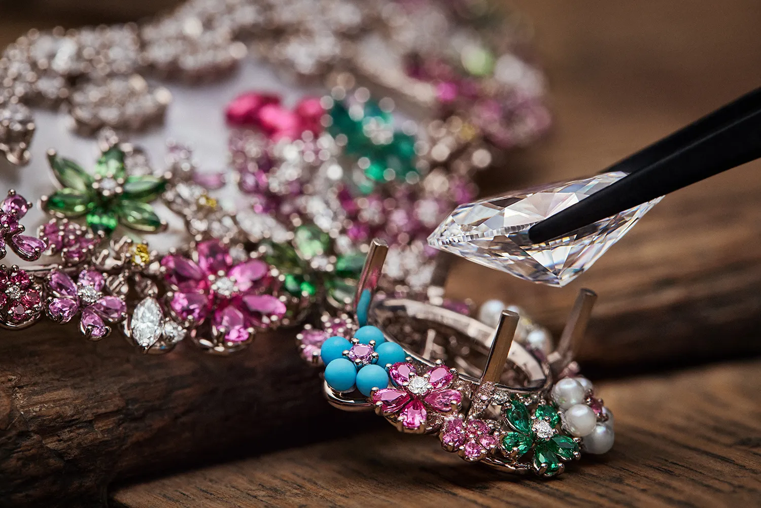 Setting the large oval-shaped diamond at the centre of the Diorexquis Foret Nacrée High Jewellery necklace. Photo credit Piotr Stoklosa