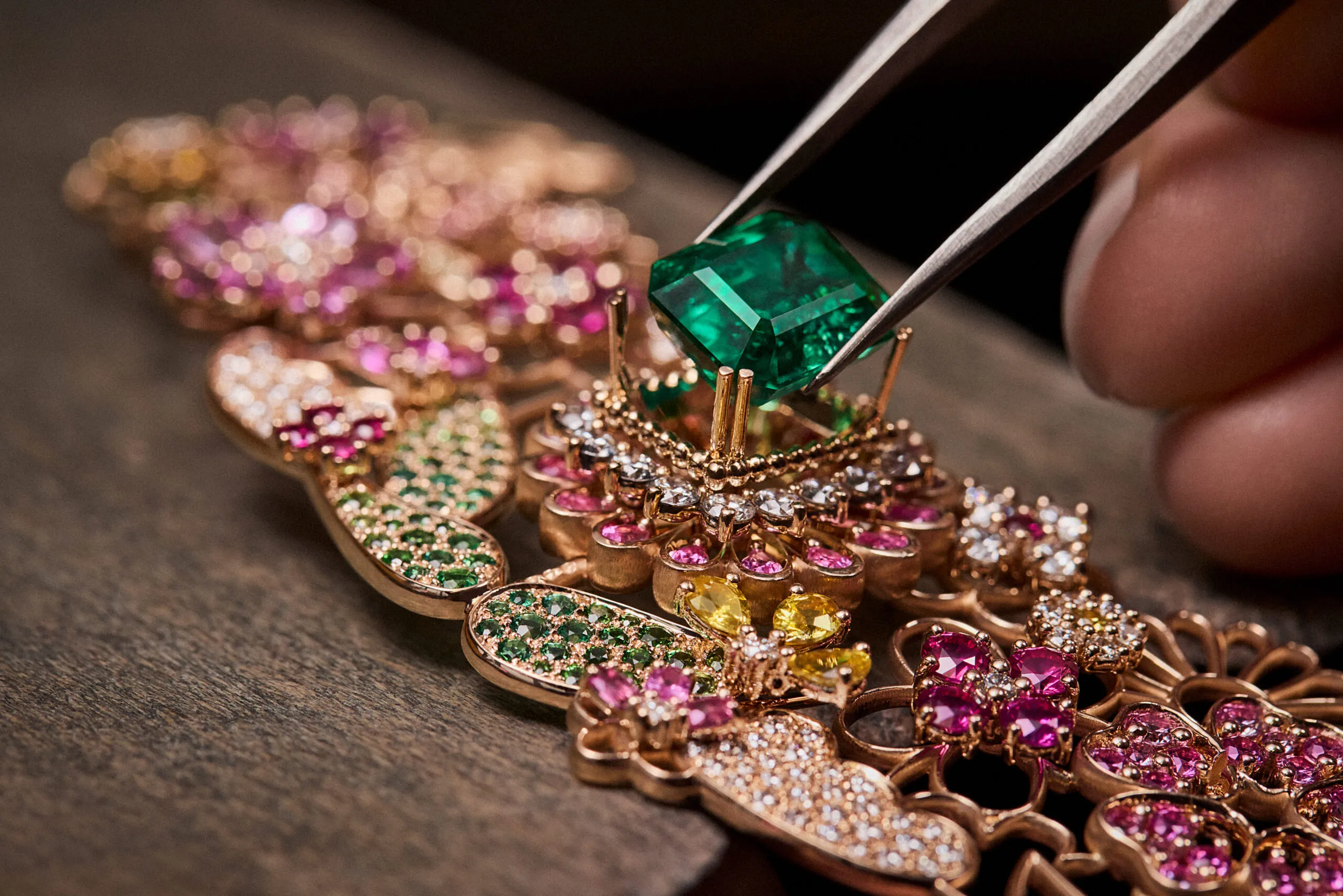 Placing an emerald solitaire in the Manege Fleuri necklace from the Dior Milly Dentelle High Jewellery collection. Photo credit Piotr Stoklosa