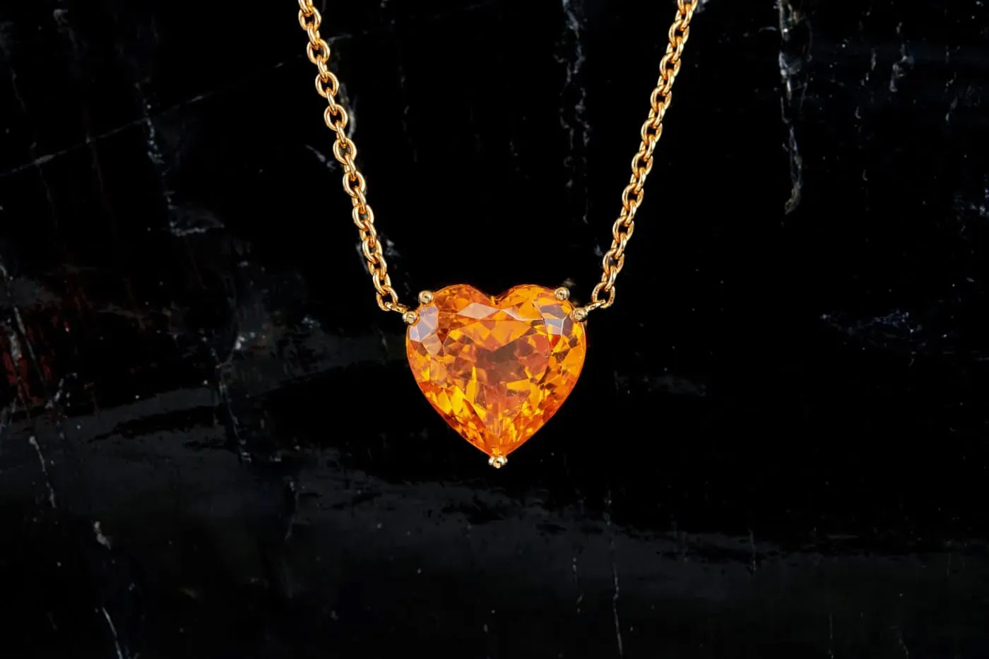 <p>Doris Hangartner heart shape mandarin garnet pendant in 18ct rose gold</p>

