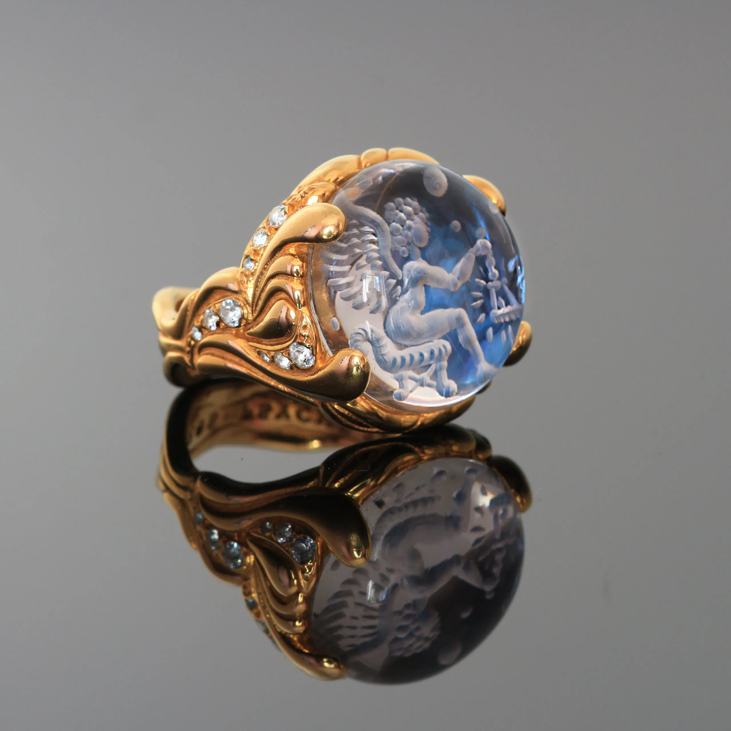 Eros-Psyche Eros Universal glyptic ring with blue topaz and rock crystal in 18k yellow gold and titanium  