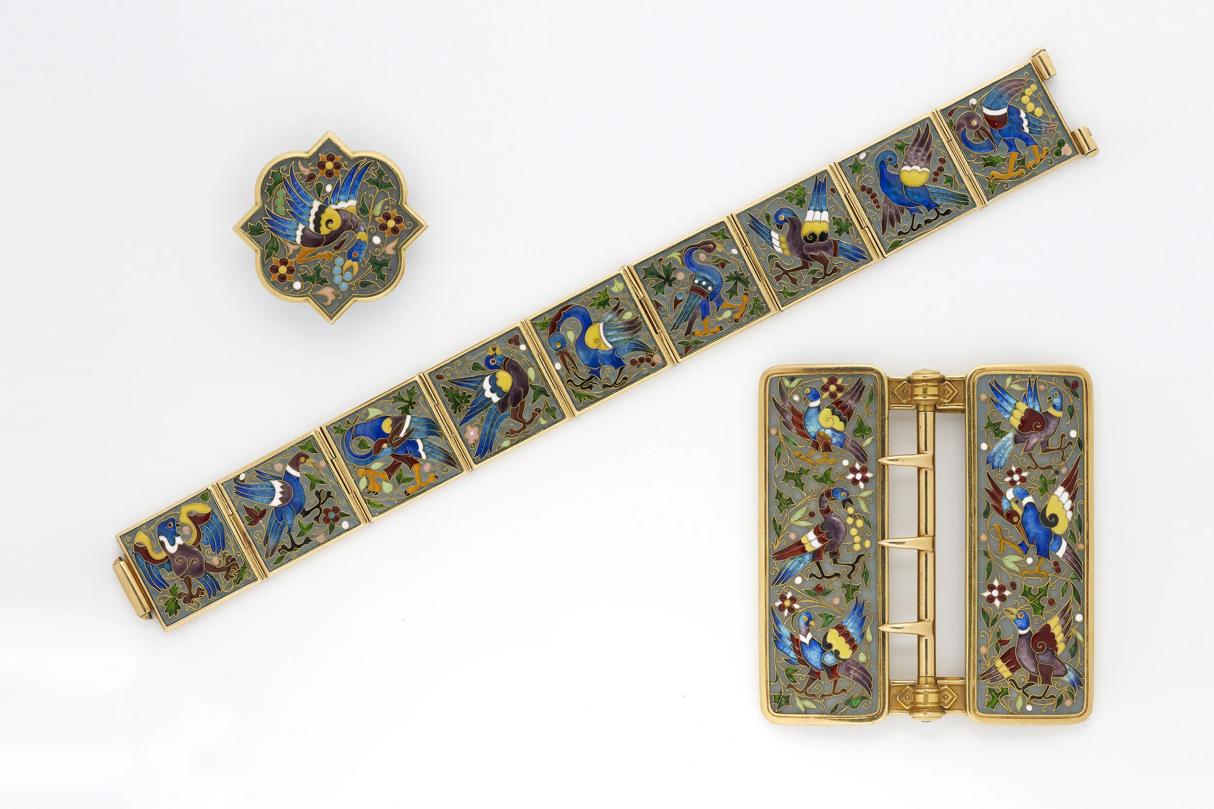 <p>A suite of jewels, including a brooch, belt-buckle and bracelet, by the renowned French jewellery house Falize, circa 1900, lent by Wartski</p>