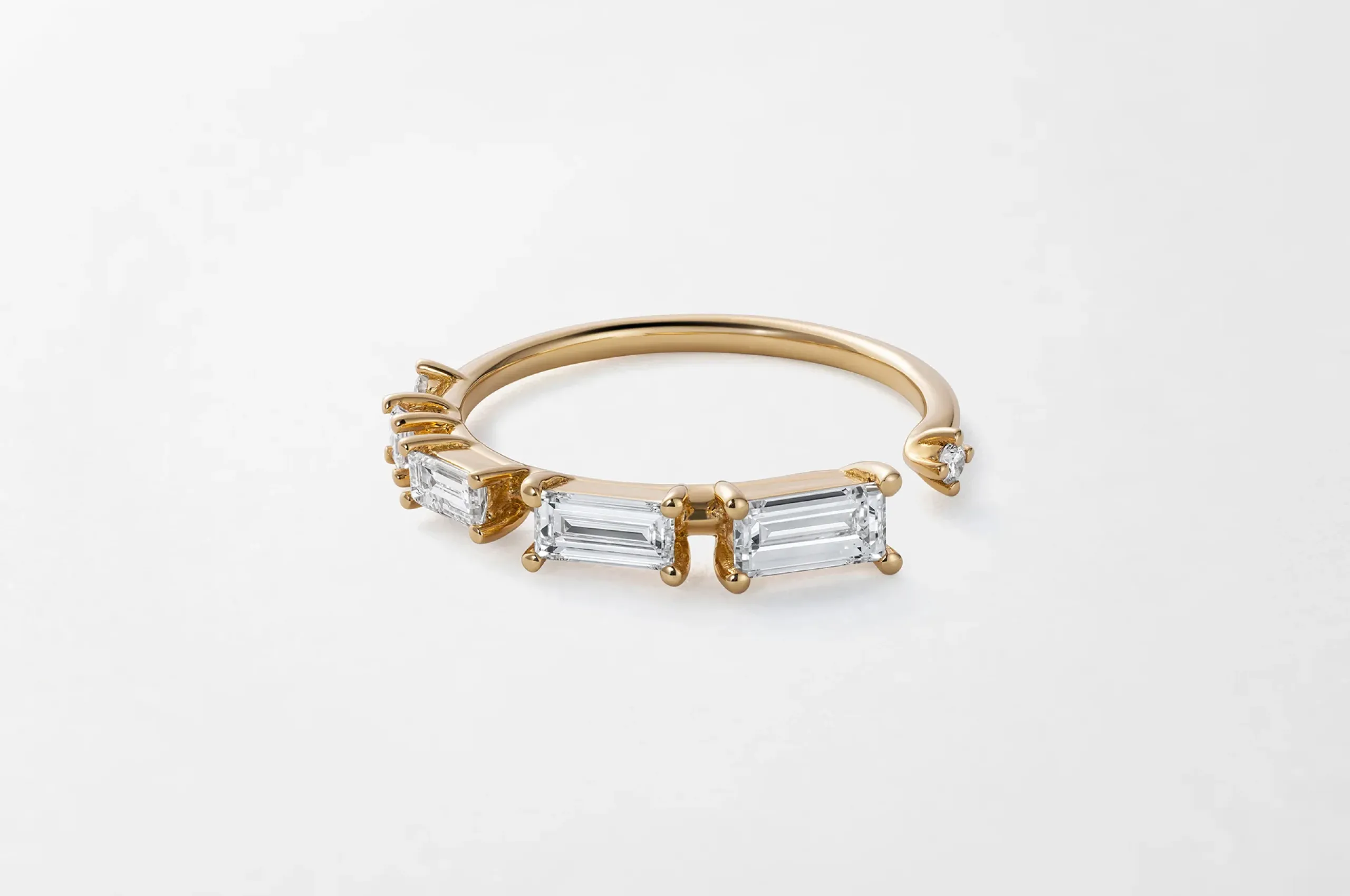 A chic choice for a promise ring, Fernando Jorge's Ascent diamond ring in 18K yellow gold puts a modern spin on the eternity band.
