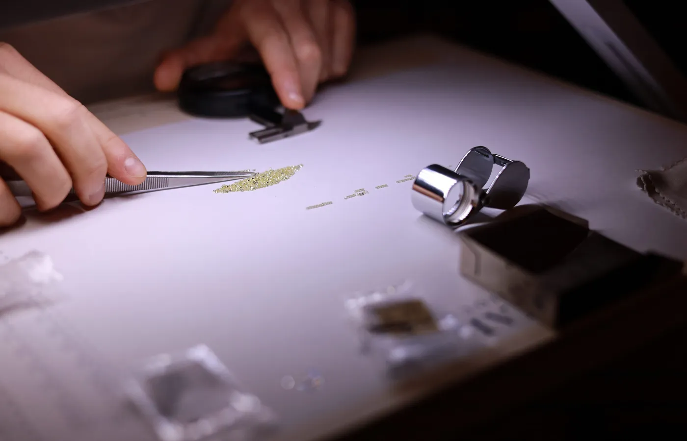 Sorting diamonds for FerriFirenze fine jewellery creations required a dark room to accurately see the light reflecting from each precious stone