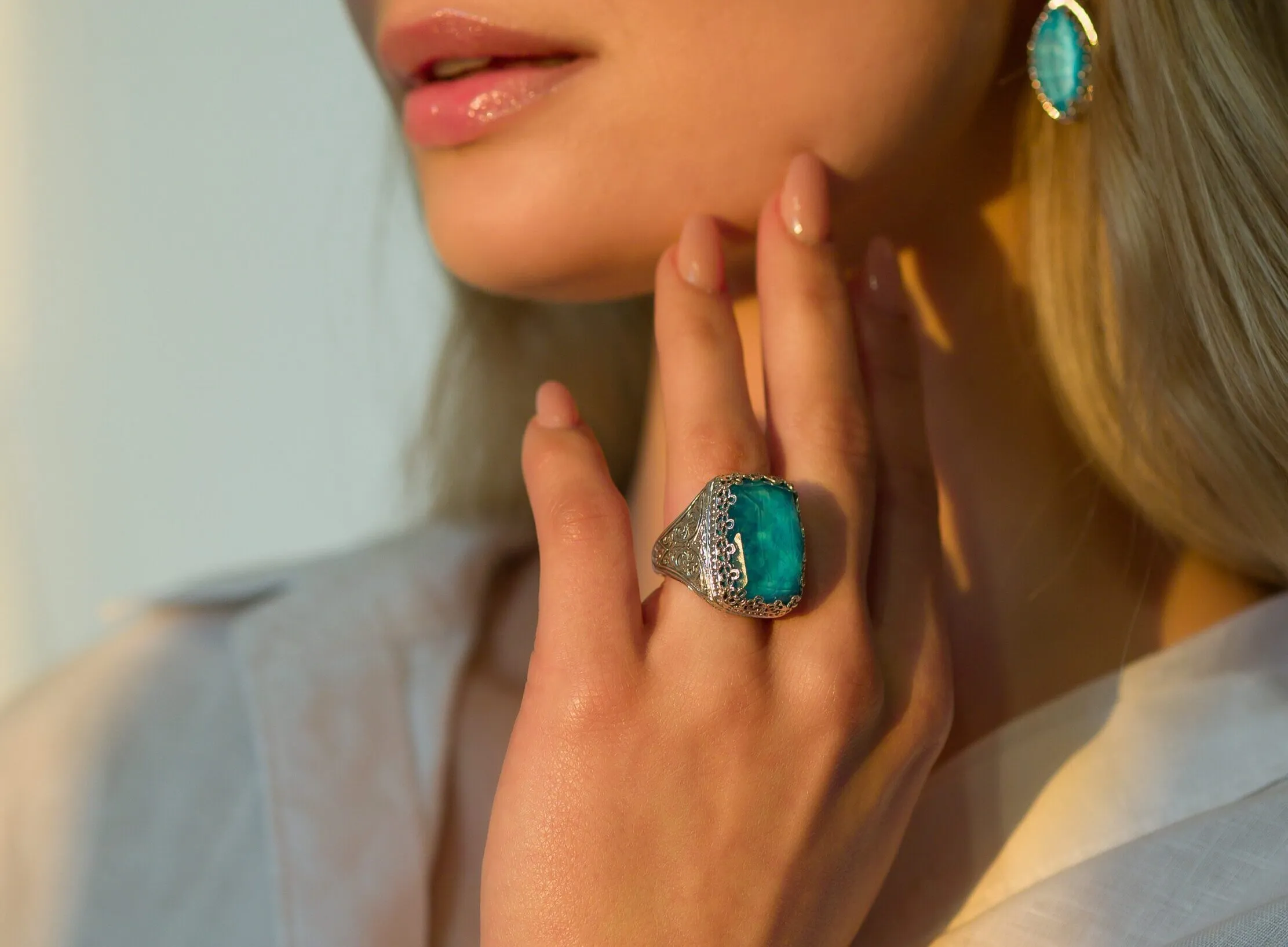 A model wears pieces from the Aegean Colours collection by Gerochristo Jewelry