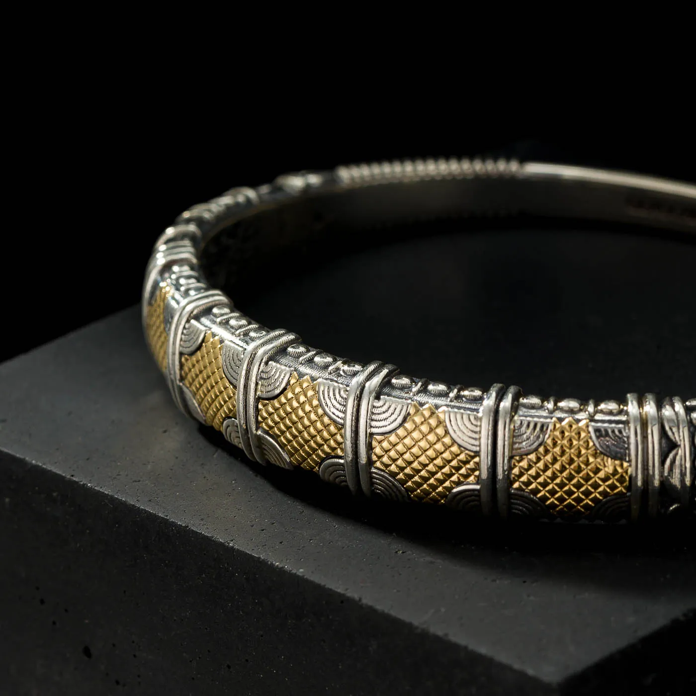 A men's bracelet in sterling silver and 18k gold from the Alexander collection by Gerochristo Jewelry