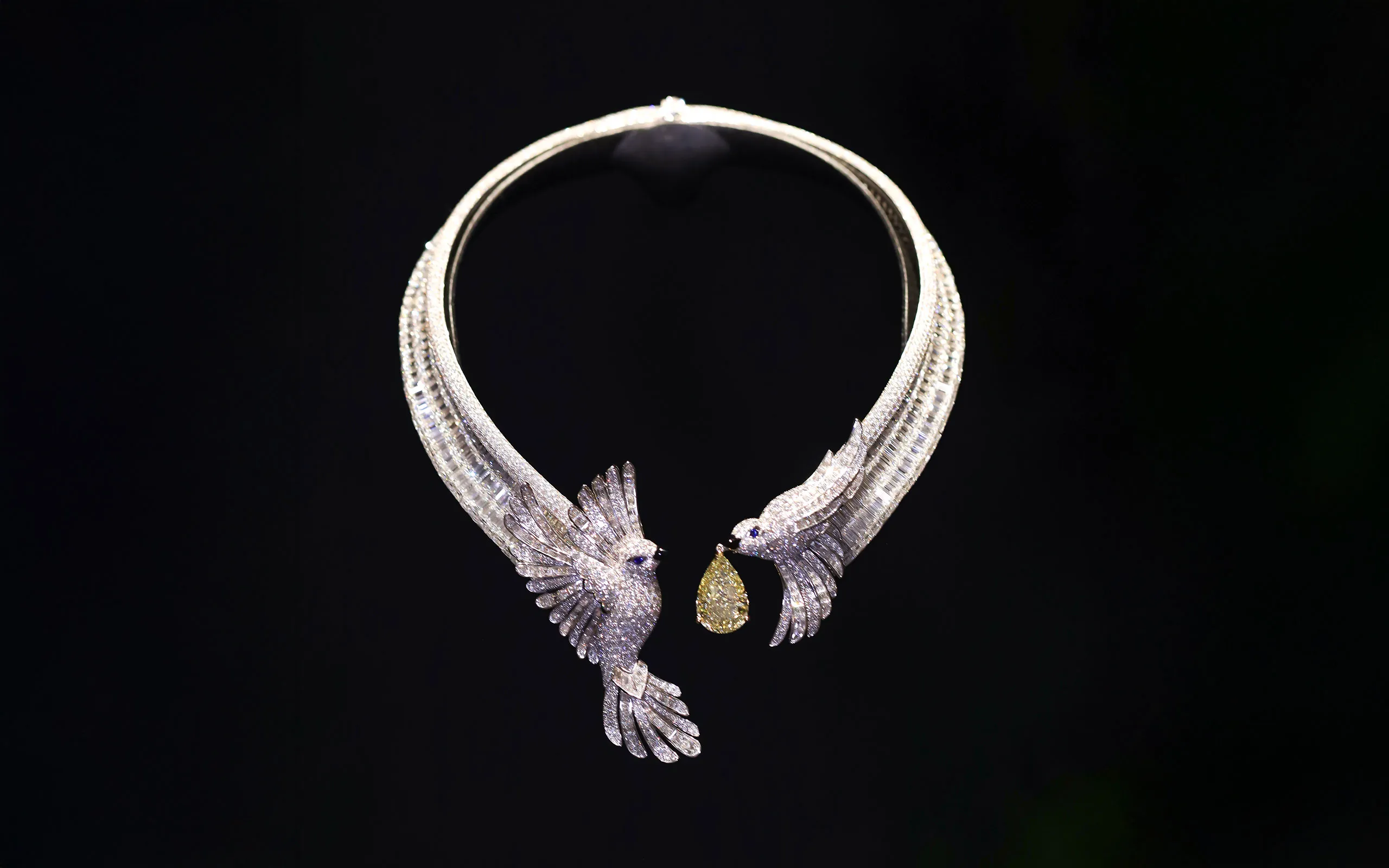 Graff The Gift of Love necklace with a 13.51-carat fancy intense yellow pear-shaped diamond and 125 carats of round brilliant-cut and custom-cut baguette diamonds in 18k white gold 