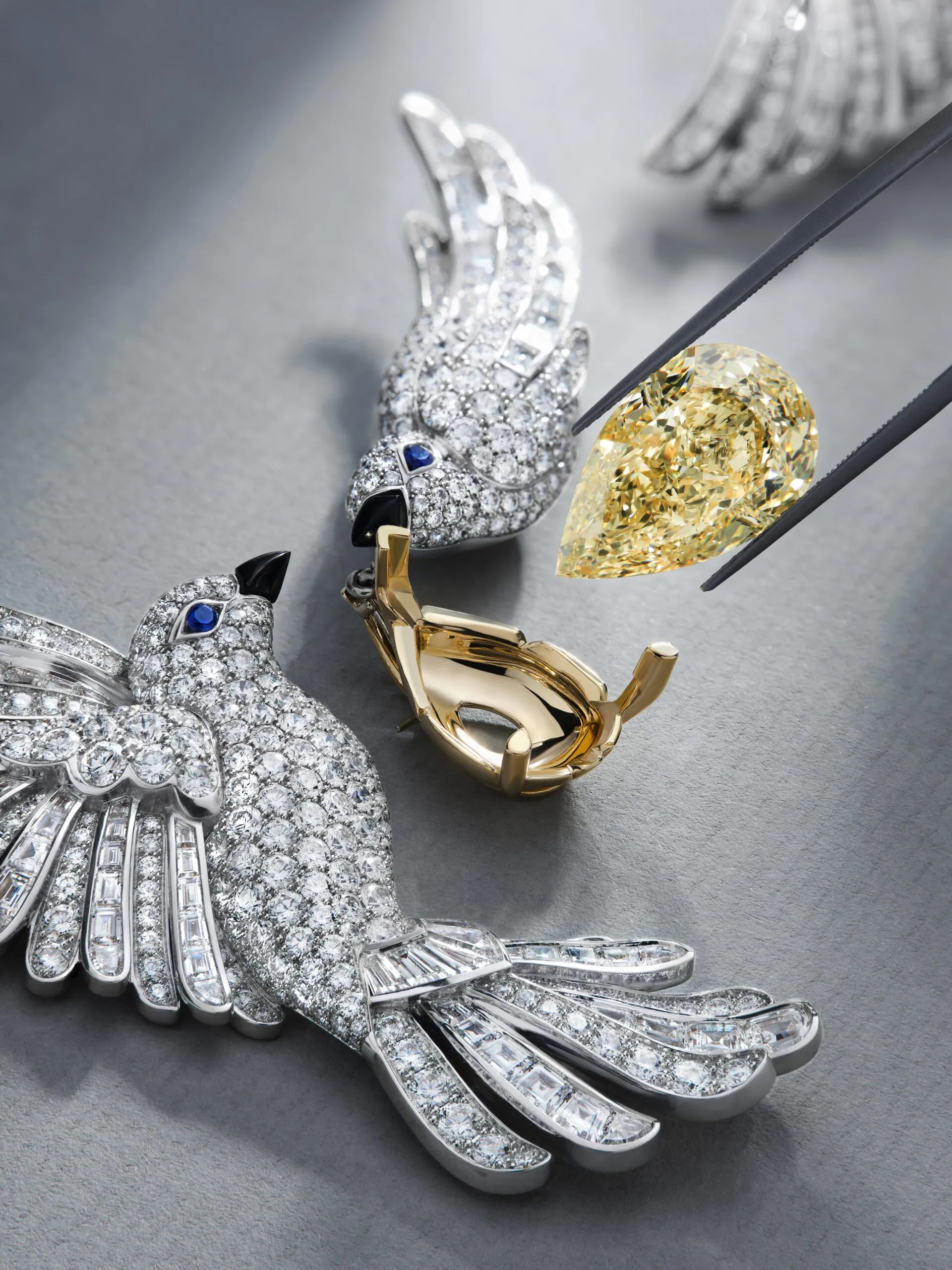 The highlight of The Gift of Love necklace by Graff is a 13.51-carat fancy intense yellow pear-shaped diamond in a yellow gold mount 