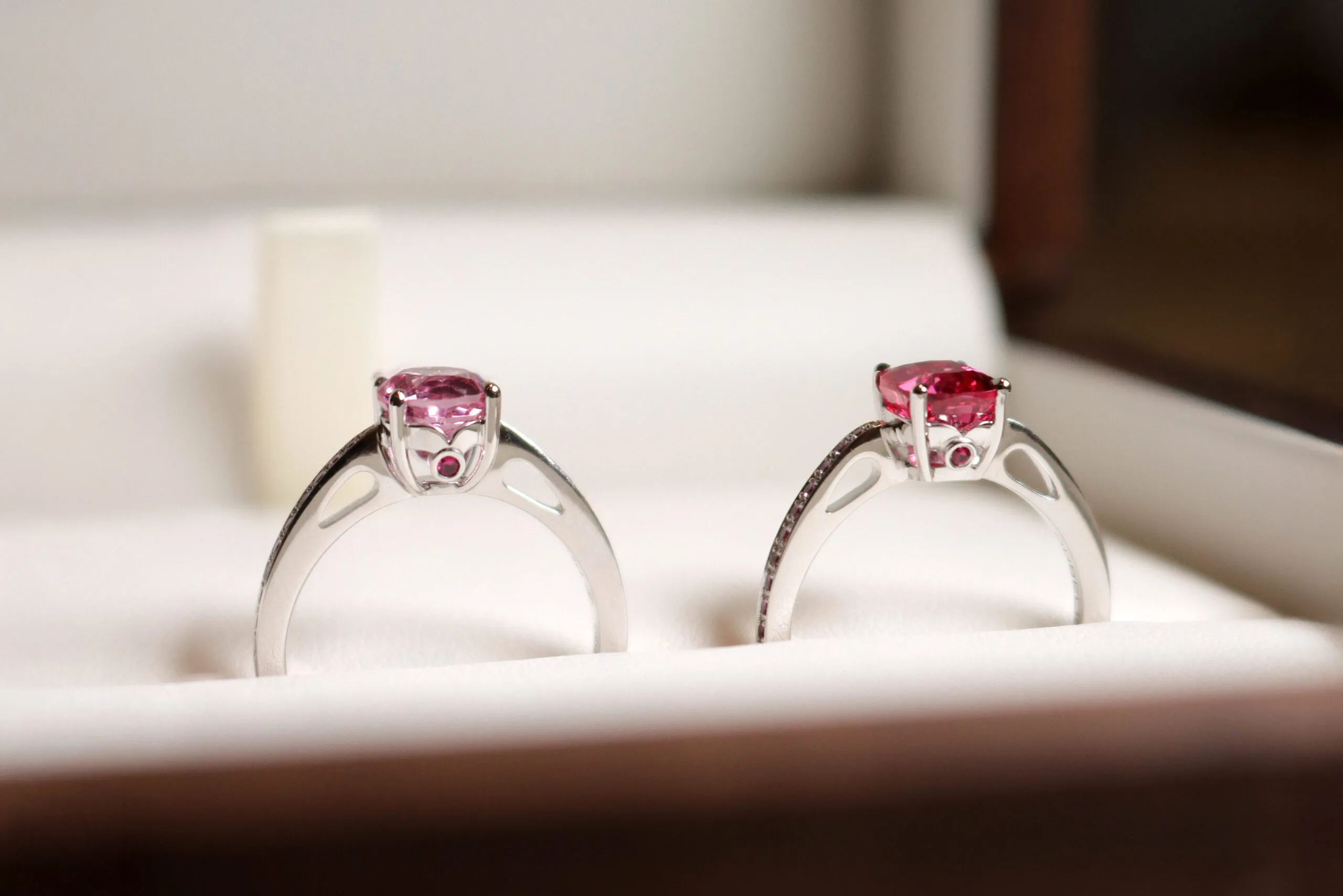 House of Gübelin spinel solitaire rings in shades of pink and red, set with the iconic Gübelin ruby in 18k white gold 