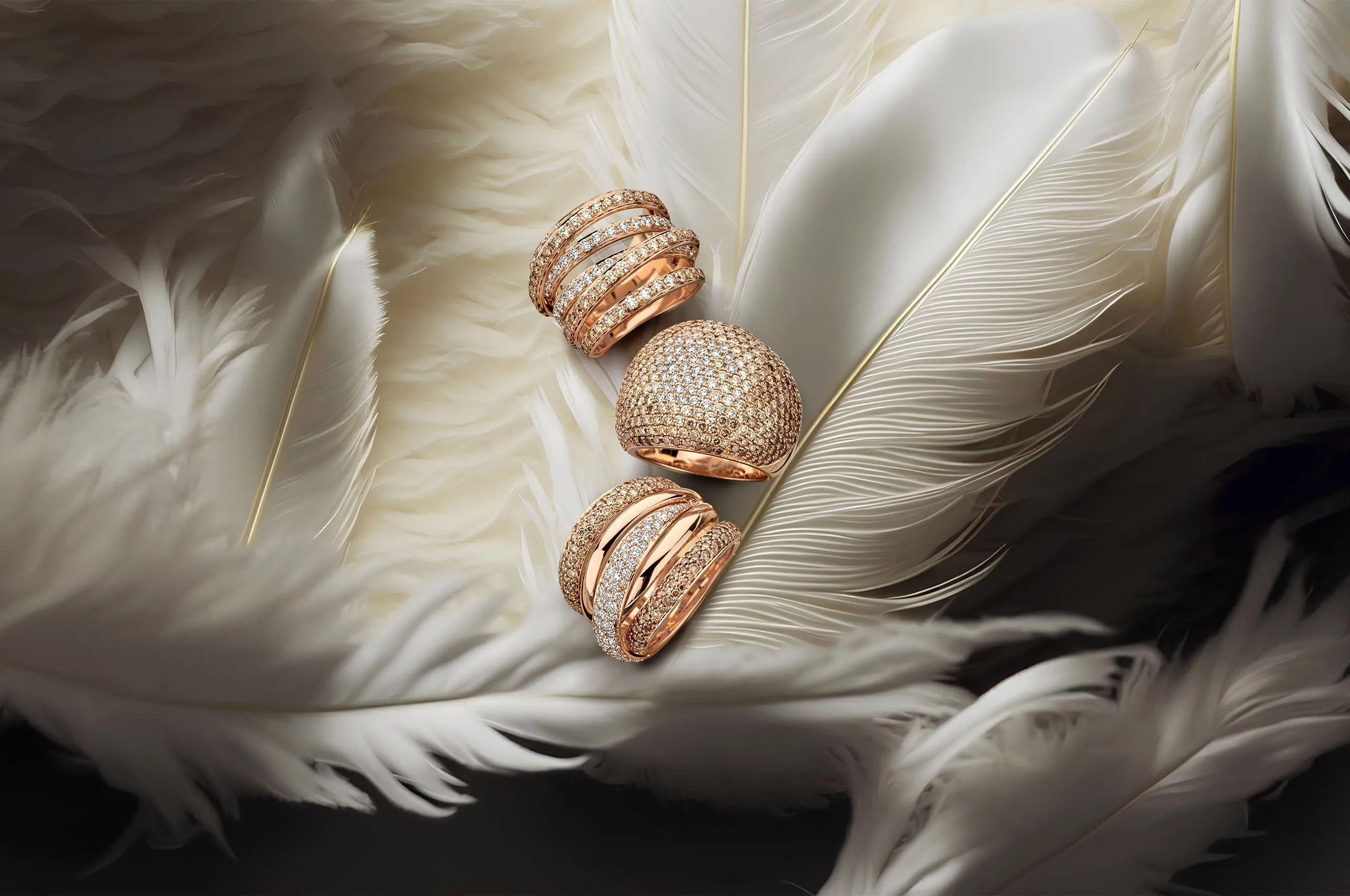 A trio of diamond rings in rose gold from the Histoire d’Elle Les Incondition 'Elle collection 