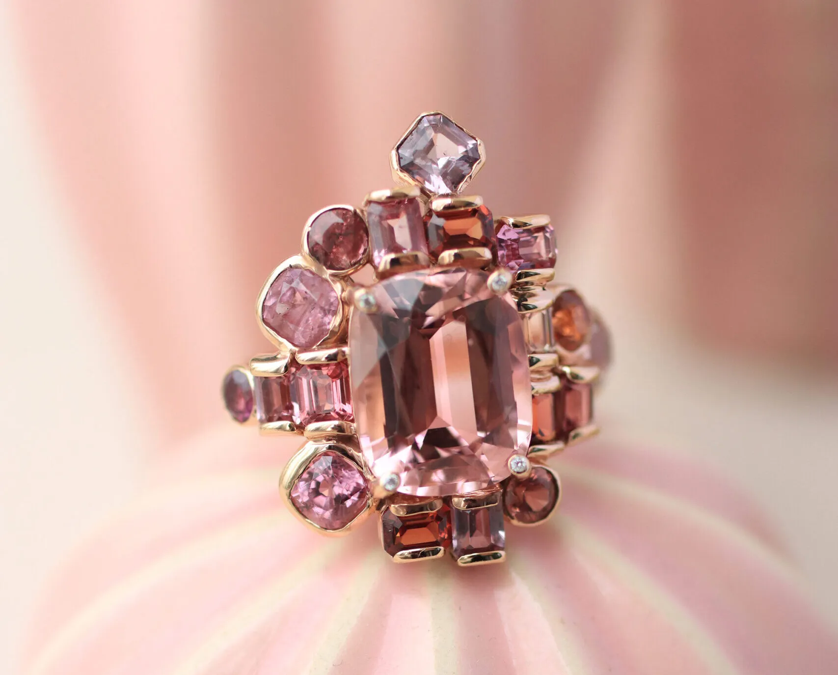 Zome Jewellery Roselle ring from the Spinelios collection with a 6.7 carat pink tourmaline, 4.5 carats of multi-coloured spinels, and diamonds in 18k rose gold 