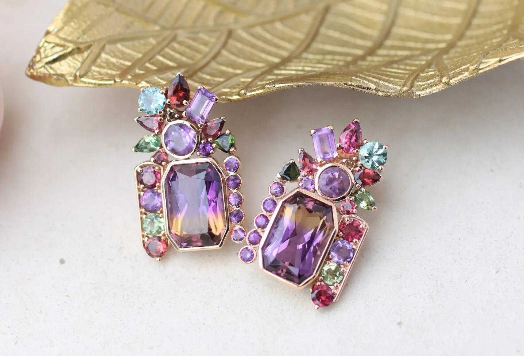 Zome Jewellery Amoreto earrings from the Ametra collection with a 9 carat ametrine, multi-coloured tourmalines, garnet and amethyst set in 18k rose gold 